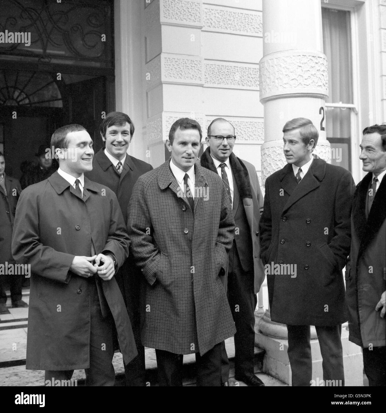 John Boyle (second from left) leaves the FA's headquarters in Lancaster Gate, London, after a disciplinary committee decided that no further action should be taken, following his red card in a match against Manchester City. With him are other Chelsea players and officials - (l-r) Ron Harris, (John Boyle), manager Dave Sexton, assistant secretary Alan Bennett and Alan Birchenall. Stock Photo
