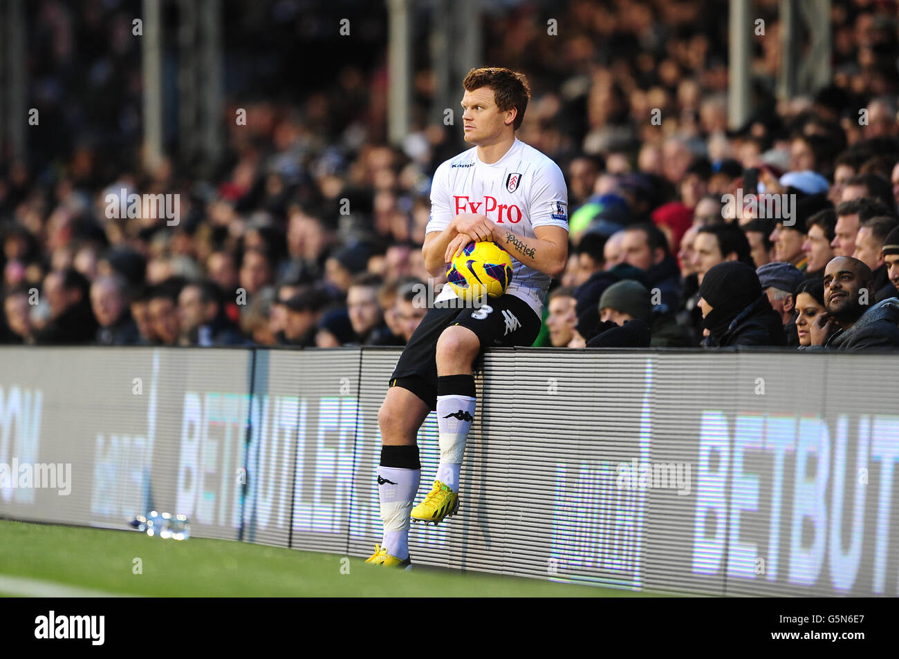 Soccer - Barclays Premier League - Fulham v Tottenham Hotspur - Craven Cottage. Fulham's John Arne Riise waits to take a throw in during a break in play Stock Photo