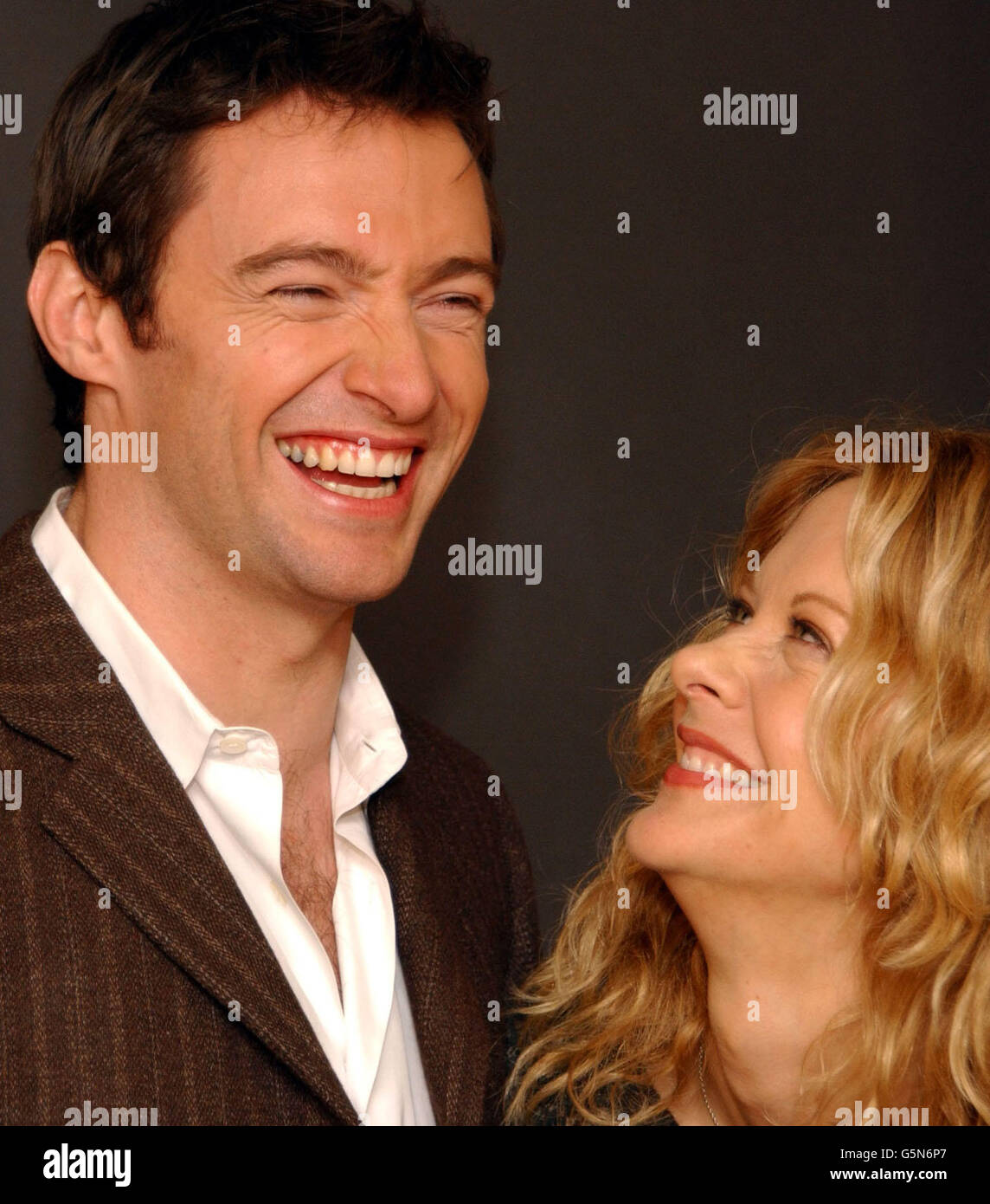 Australian actor Hugh Jackman and US actress Meg Ryan during a photocall at the Dorchester Hotel, London to promote their new film Kate & Leopold. Stock Photo