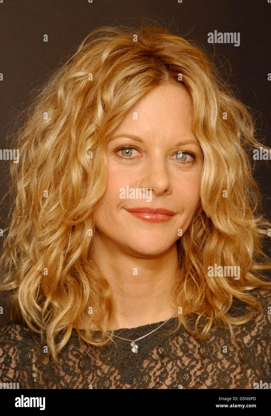 US actress Meg Ryan during a photocall at the Dorchester Hotel, London to promote their new film Kate & Leopold. lwpgalnews 29/01/04: Meg Ryan who has defended her sulky appearance on the BBC1 chat show Parkinson, it was revealed. The 42-year-old actress said that she felt Parkinson was 'hostile' from the start of the interview and she had been in the right to act the way she did. Stock Photo