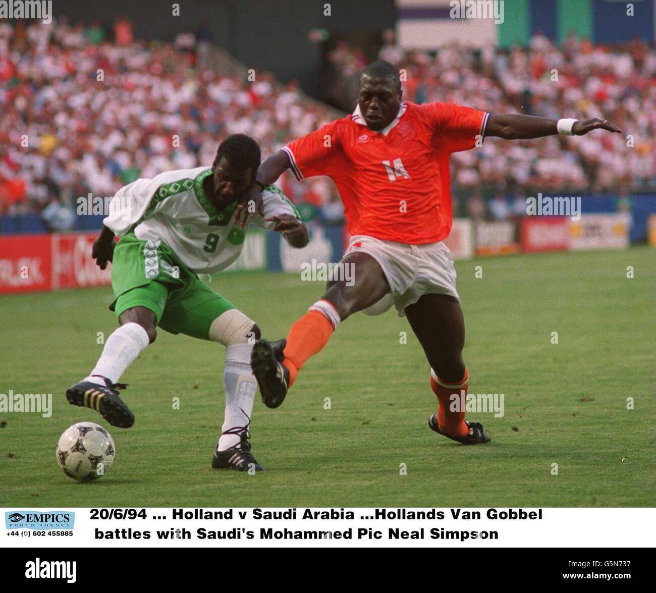 20/6/94 ... Holland v Saudi Arabia ...Hollands Van Gobbel battles with Saudi's Mohammed Stock Photo