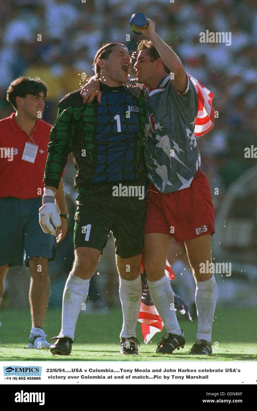 Soccer - World Cup USA 94 - Group A - USA v Colombia. Tony Meola and John Harkes celebrate USA's victory over Colombia at end of match Stock Photo
