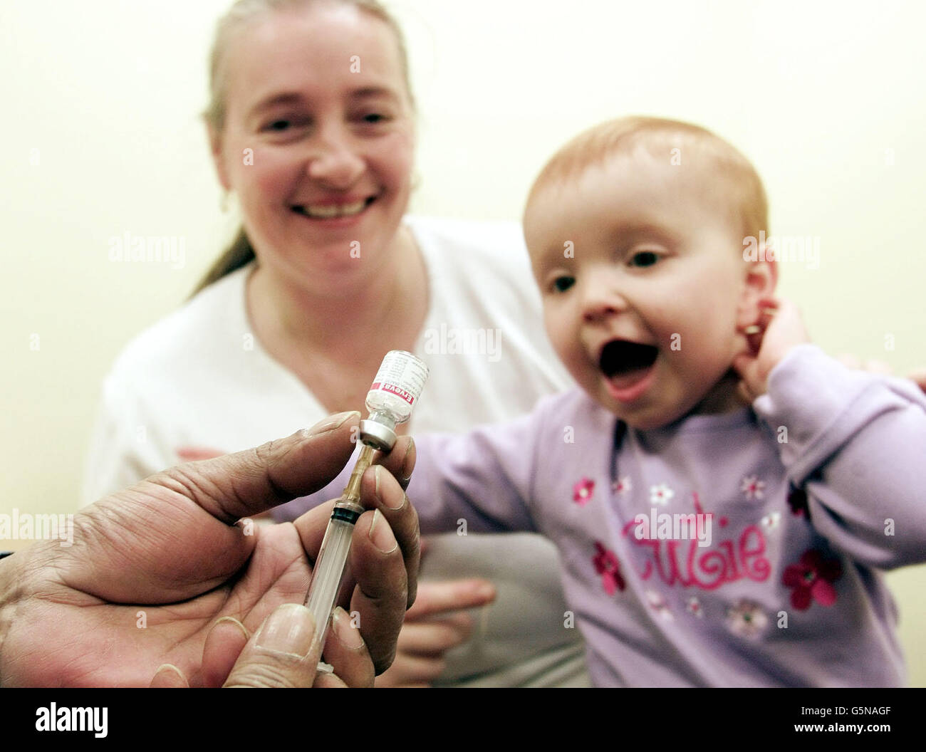 Chloe Hamilton, 16 months with mother, Linda Hamilton about to be given the single Rubella vaccination instead of the combined MMR jab, at Direct Health 2000 at the Woodlands Hospital, Darlington. Stock Photo