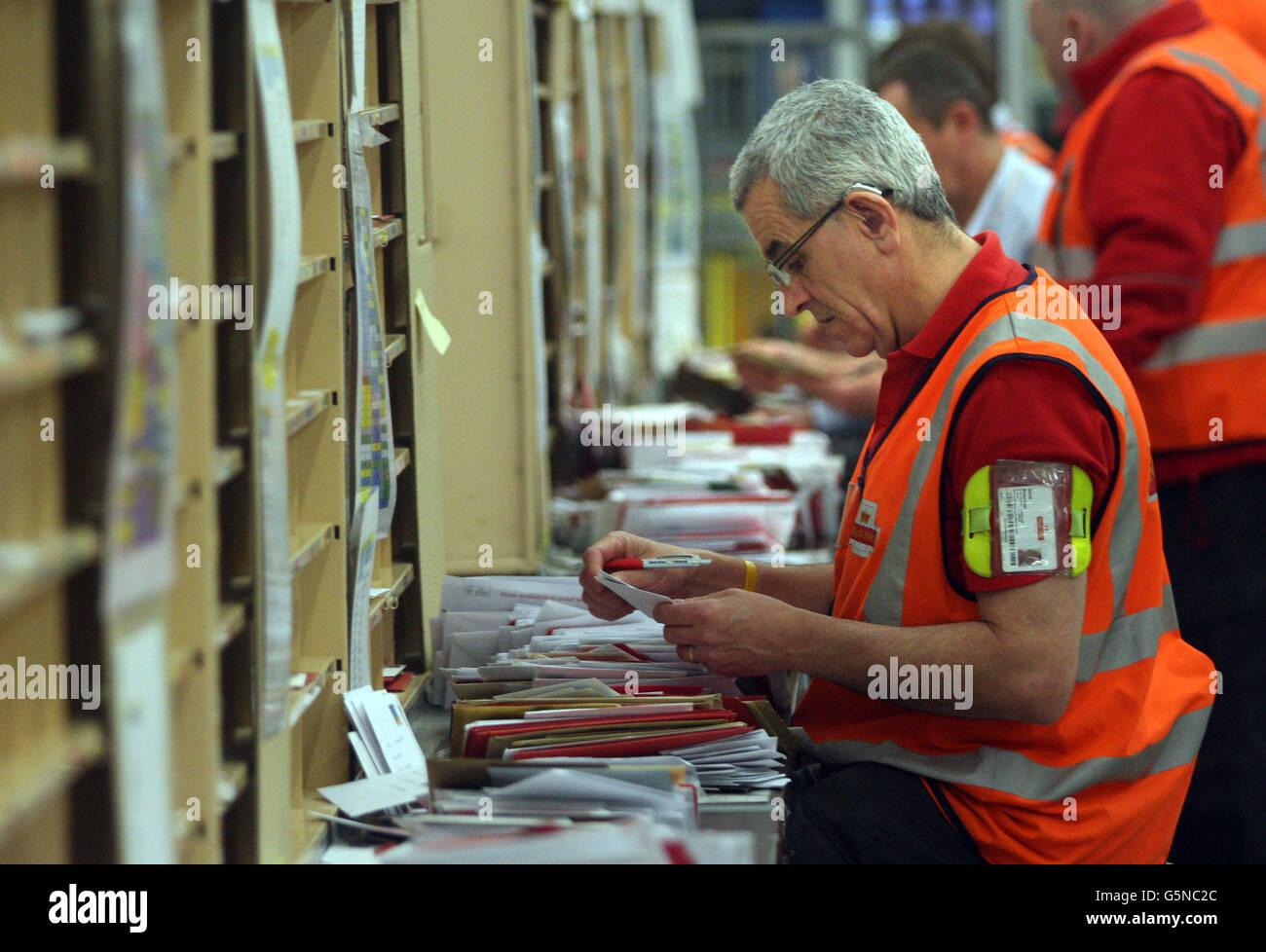 Workers at Edinburgh's Royal Mail Centre in its busiest week of the festive season. PRESS ASSOCIATION Photo:Photo date: Tuesday December 18, 2012. Photo credit should read David Cheskin/PA Wire Stock Photo