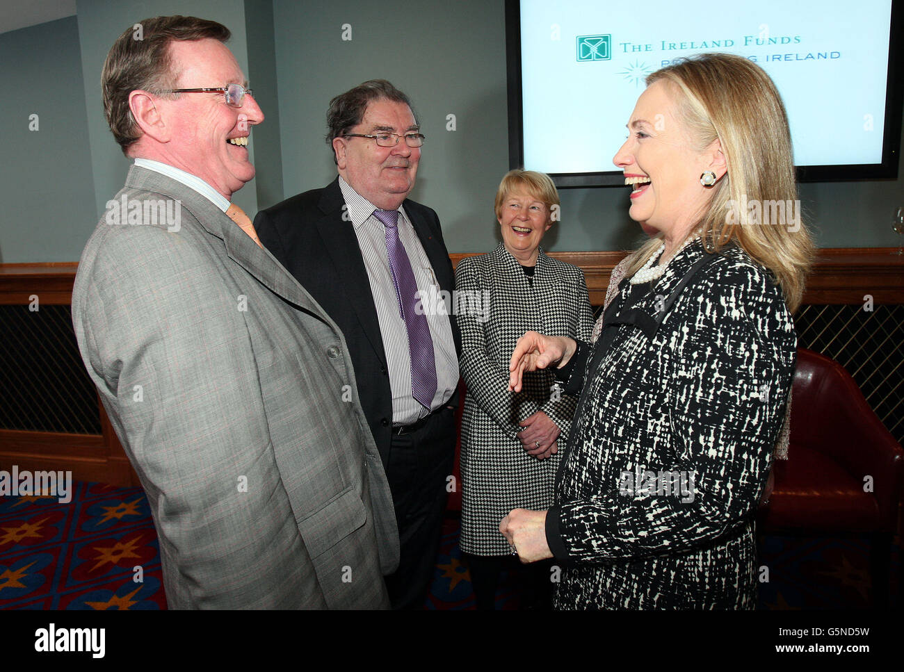 US Secretary of State Hilary Clinton, meets former First Minister David Trimble (left) and former leader of the SDLP John Hume at Titanic Belfast in Belfast as part of her four-day trip to Europe. Stock Photo