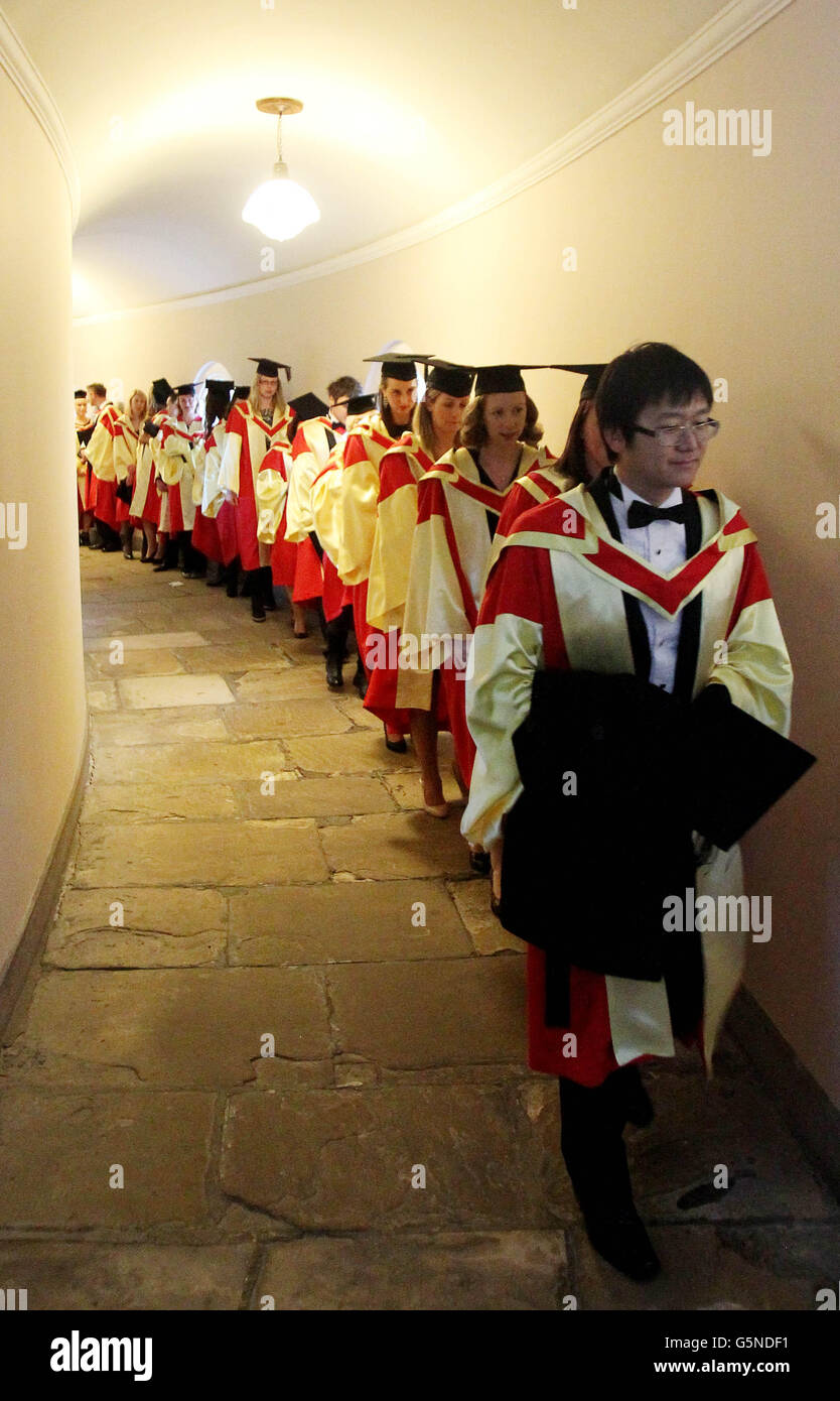Students wait in precession before they are conferred with their Degrees at Trinity College Dublin, Ireland today. Stock Photo