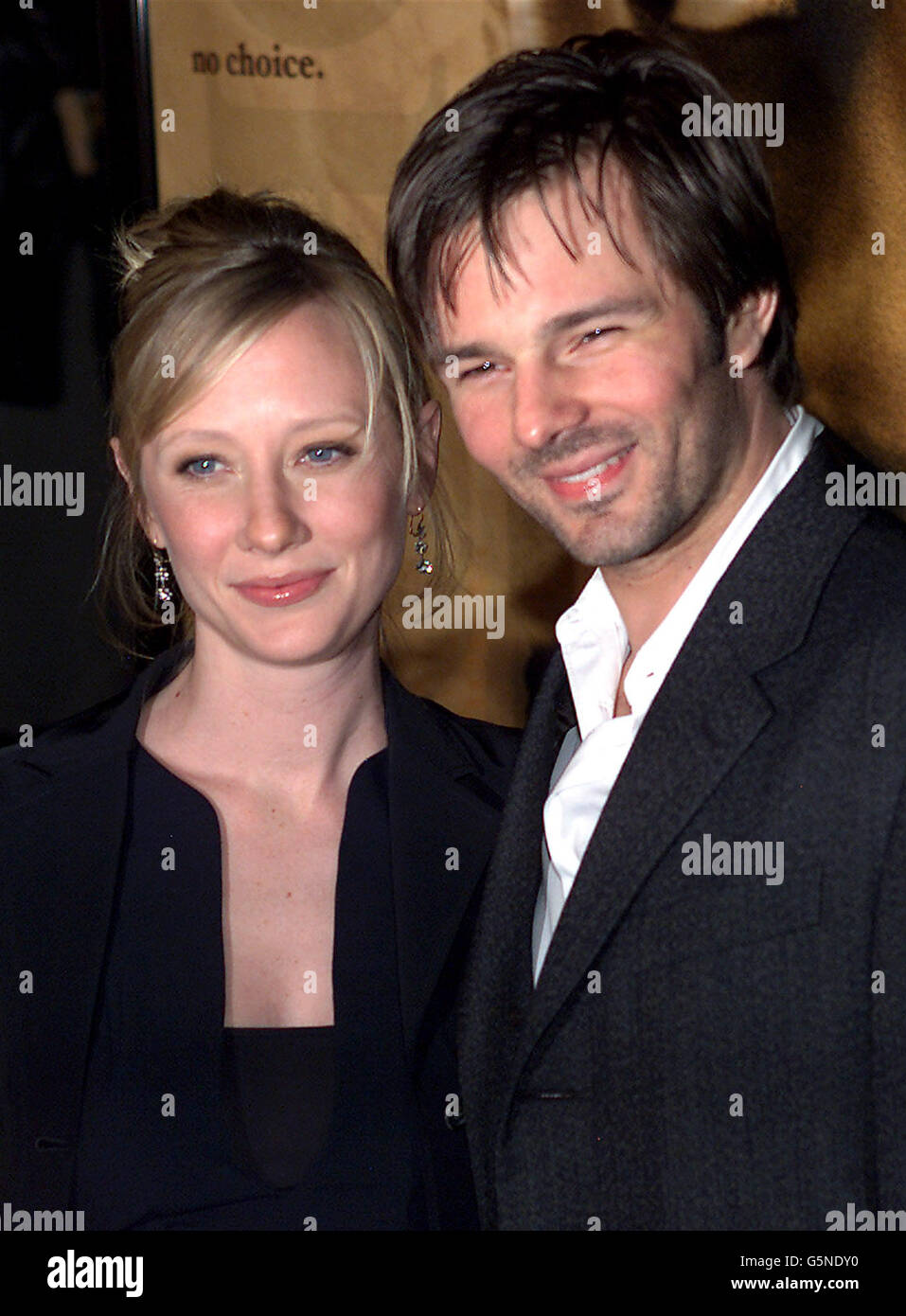 Pregnant actress Anne Heche with her husband Coley Laffoon arrives for the premiere of her new movie 'John Q' in Hollywood, California. Stock Photo