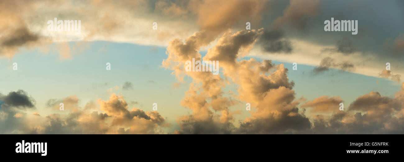 Natural background of colorful golden sky during sunset time. High ...