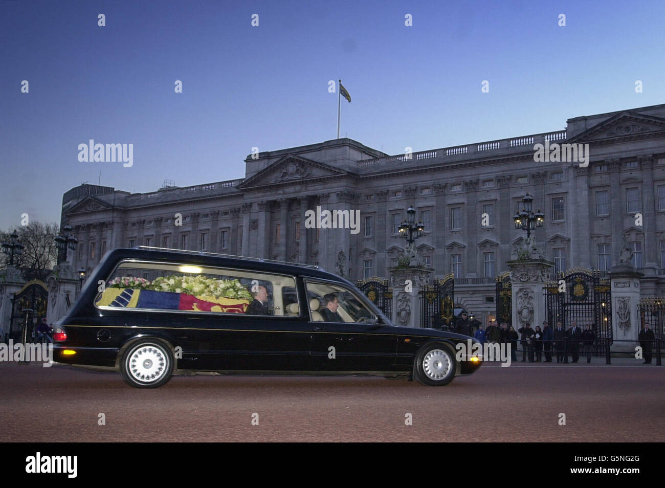 The hearse carrying the coffin of Princess Margaret - the younger sister of Britain's Queen Elizabeth II - passes Buckingham Palace, as it travels from The Queen's Chapel at St James's Palace to Windsor Castle for her funeral. Stock Photo