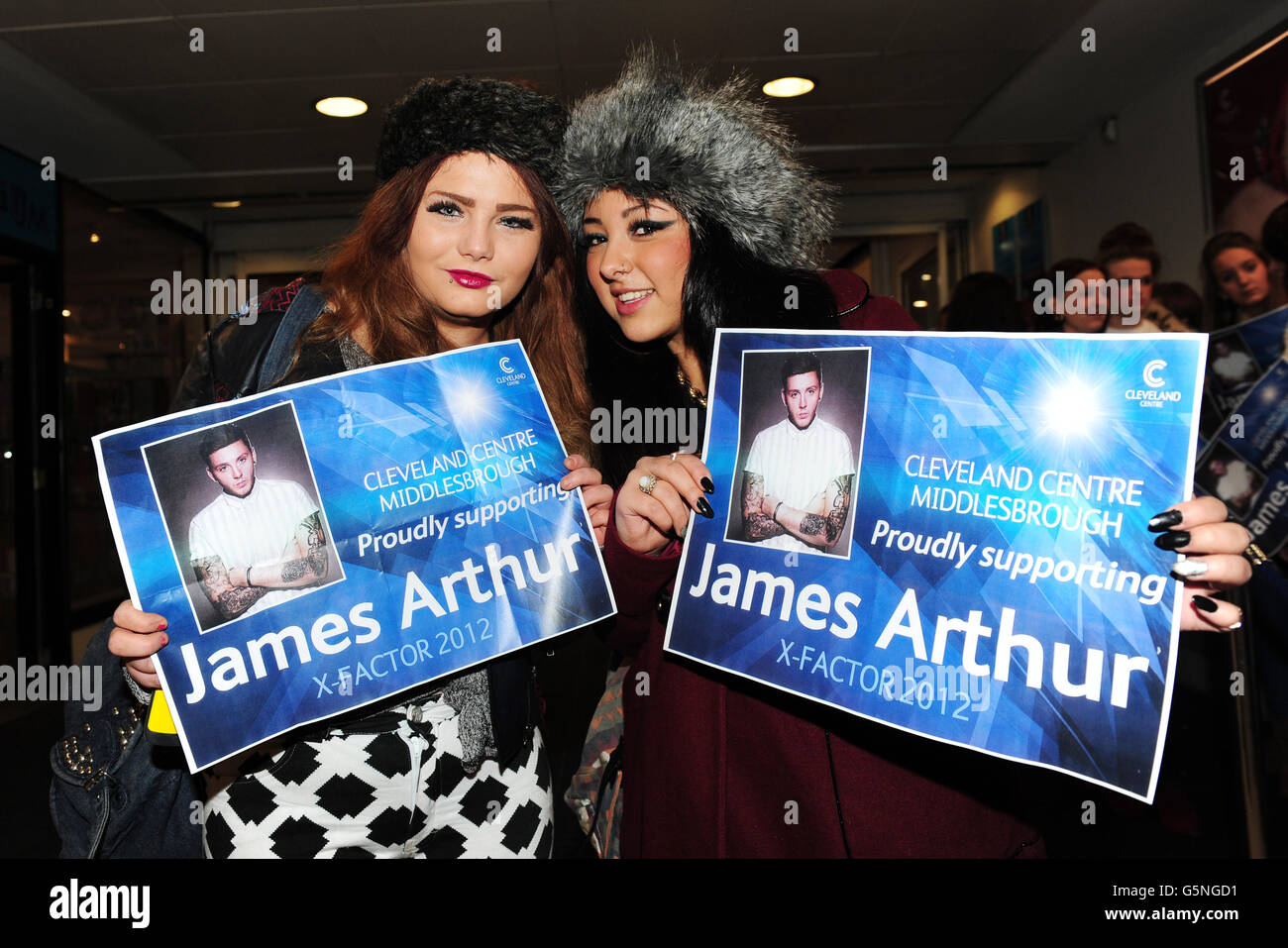 Fans Chloe Stockdale and Cherise Conroy wait to meet X Factor winner James Arthur in HMV at the Cleveland Centre, Middlesbrough. Stock Photo