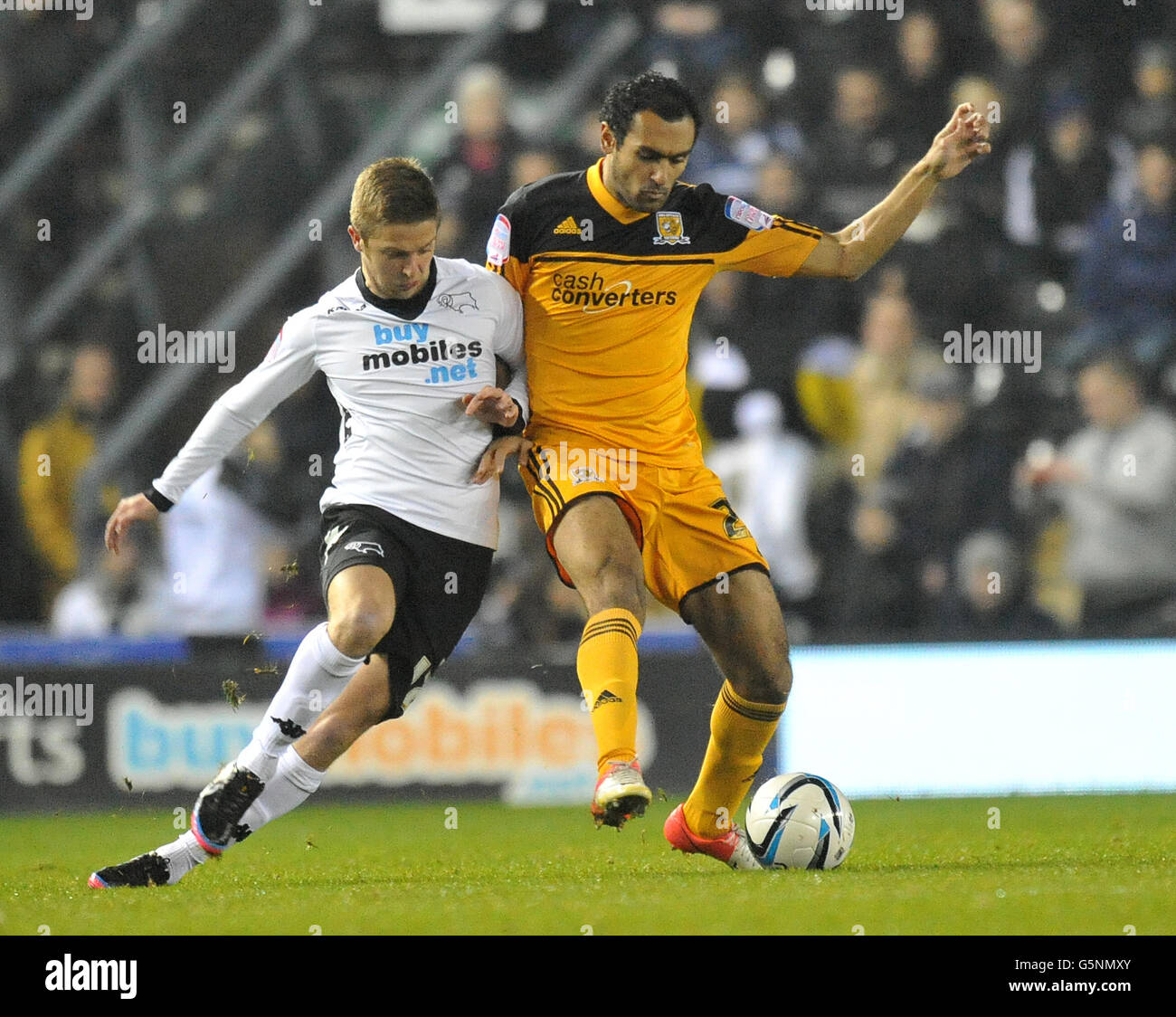 Derby countys craig bryson battles with hull citys ahmed elmohamady hi