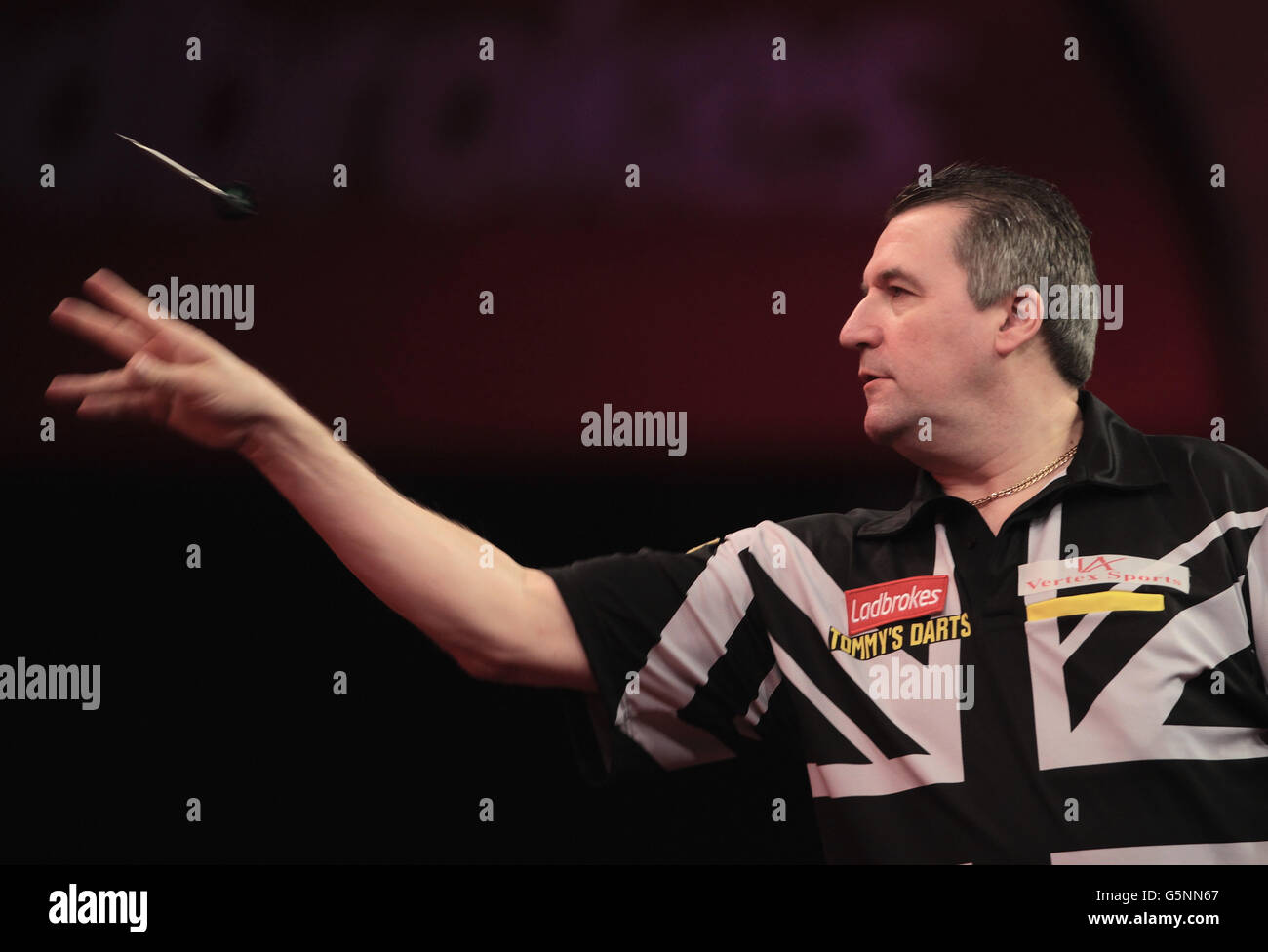 Ronnie Baxter in action against Kevin Painter during the Second Round