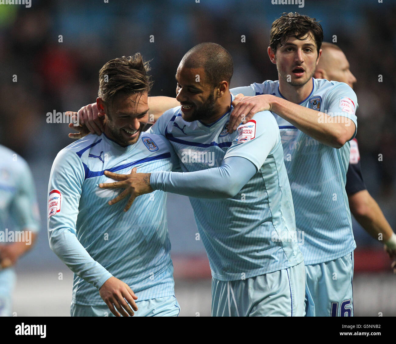 Coventry City's James Bailey is congratulated on scoring by David McGoldrick during the npower Football League one match at the Ricoh Arena, Coventry. Stock Photo