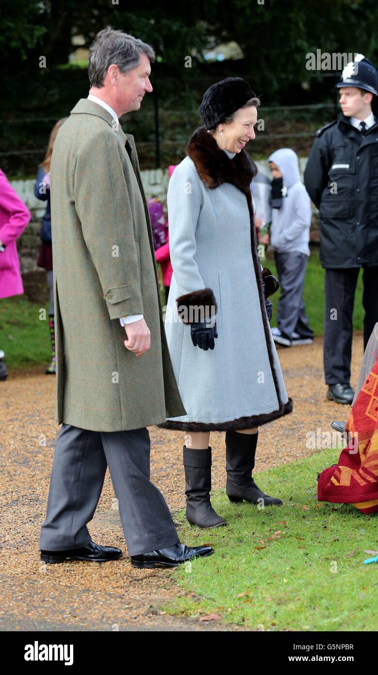 The Princess Royal and husband Vice Admiral Sir Timothy Laurence after they attended St Mary Magdalene Church, on the royal estate in Sandringham, Norfolk for the traditional Christmas Day church service. Stock Photo