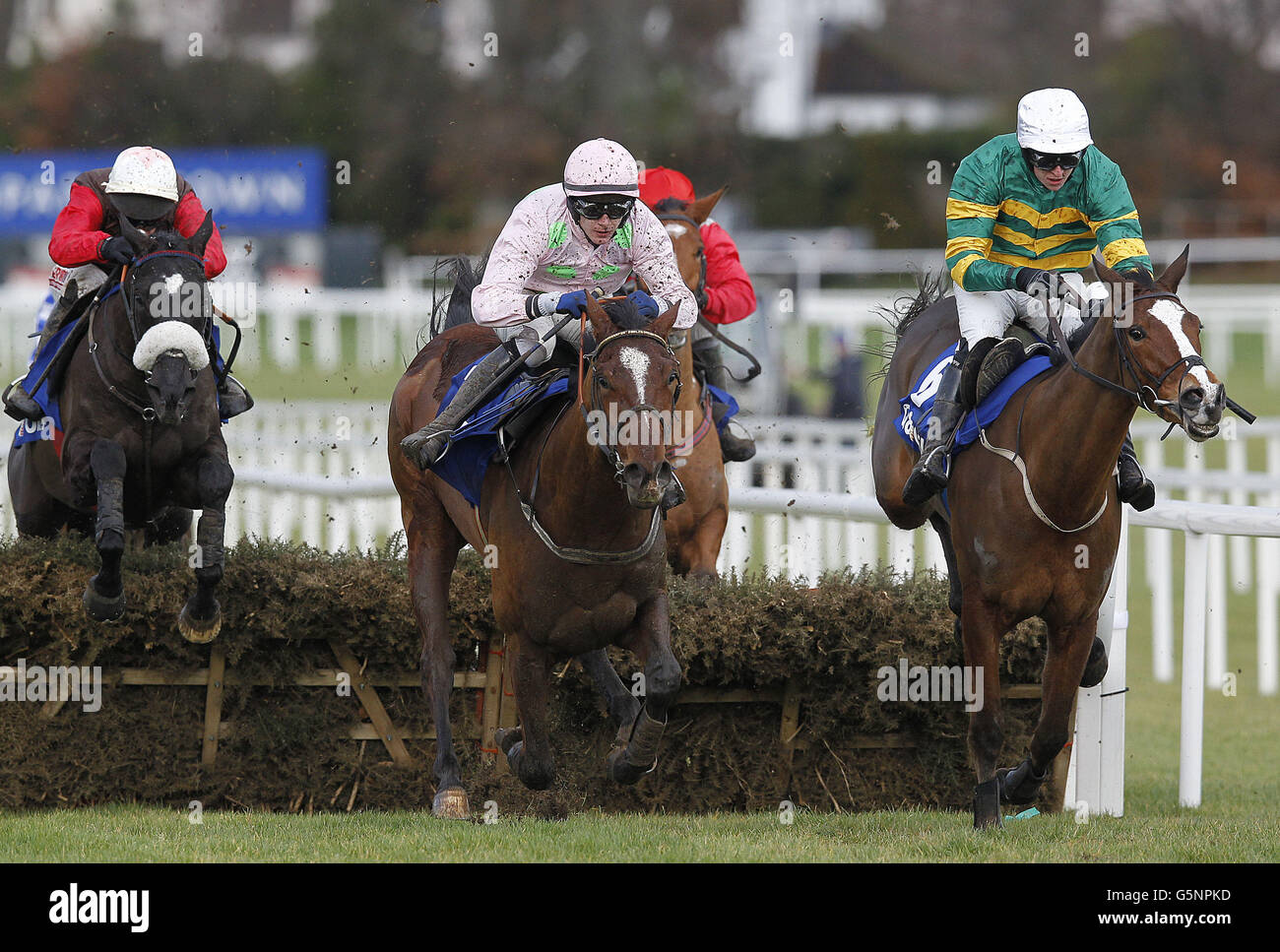 Blood Cotil under jockey Paul Townend (centre) races to win the Q8 Oils Juvenile Hurdle ahead of Stocktons Wing under jockey Mark Walsh during the Leopardstown Christmas Festival at Leopardstown Racecourse, Dublin, Ireland. Stock Photo