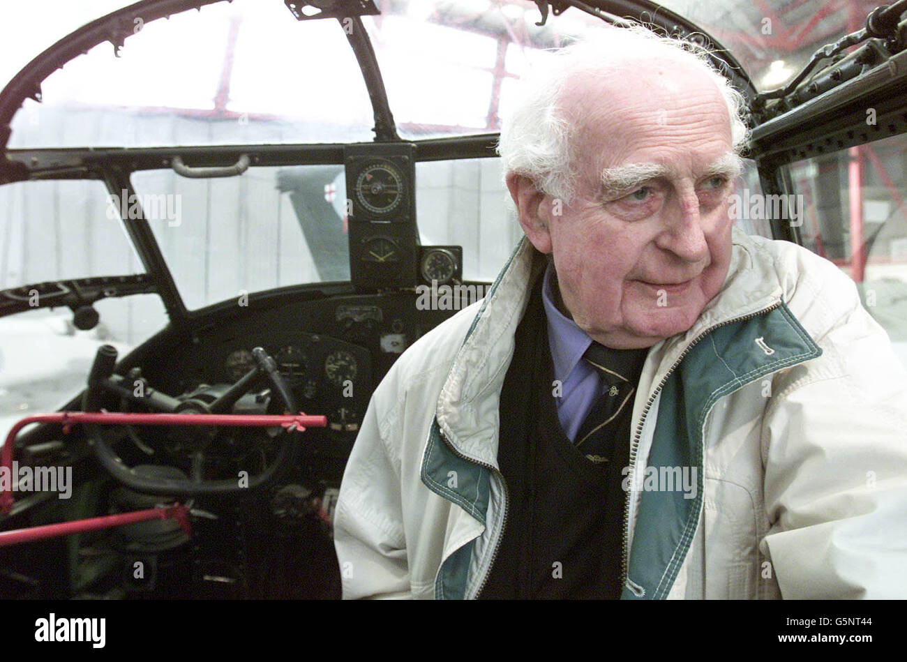 Peter George, 1st Officer with the Air Transport Auxiliary, sits in the cockpit of a Lancaster Bomber during celebrations to mark the 60th anniversary of the plane's 2nd World War missions, at Duxford Air Museum, Cambridgeshire. * RAF veterans criticised the Ministry of Defence's failure to recognise the achievements of Bomber Command, feeling that campaign medals should have been awarded to the crews despite the controversy caused by the number of civilians killed during the bombing raids over Germany, which are seen as a vital contribution to the Allied victory. Stock Photo