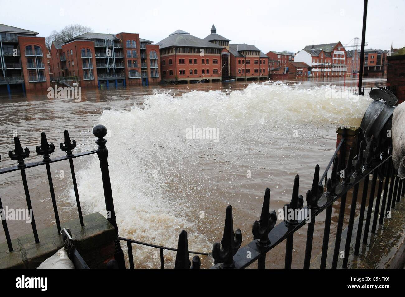 Pumps are used to help stop water from flooding homes in York city