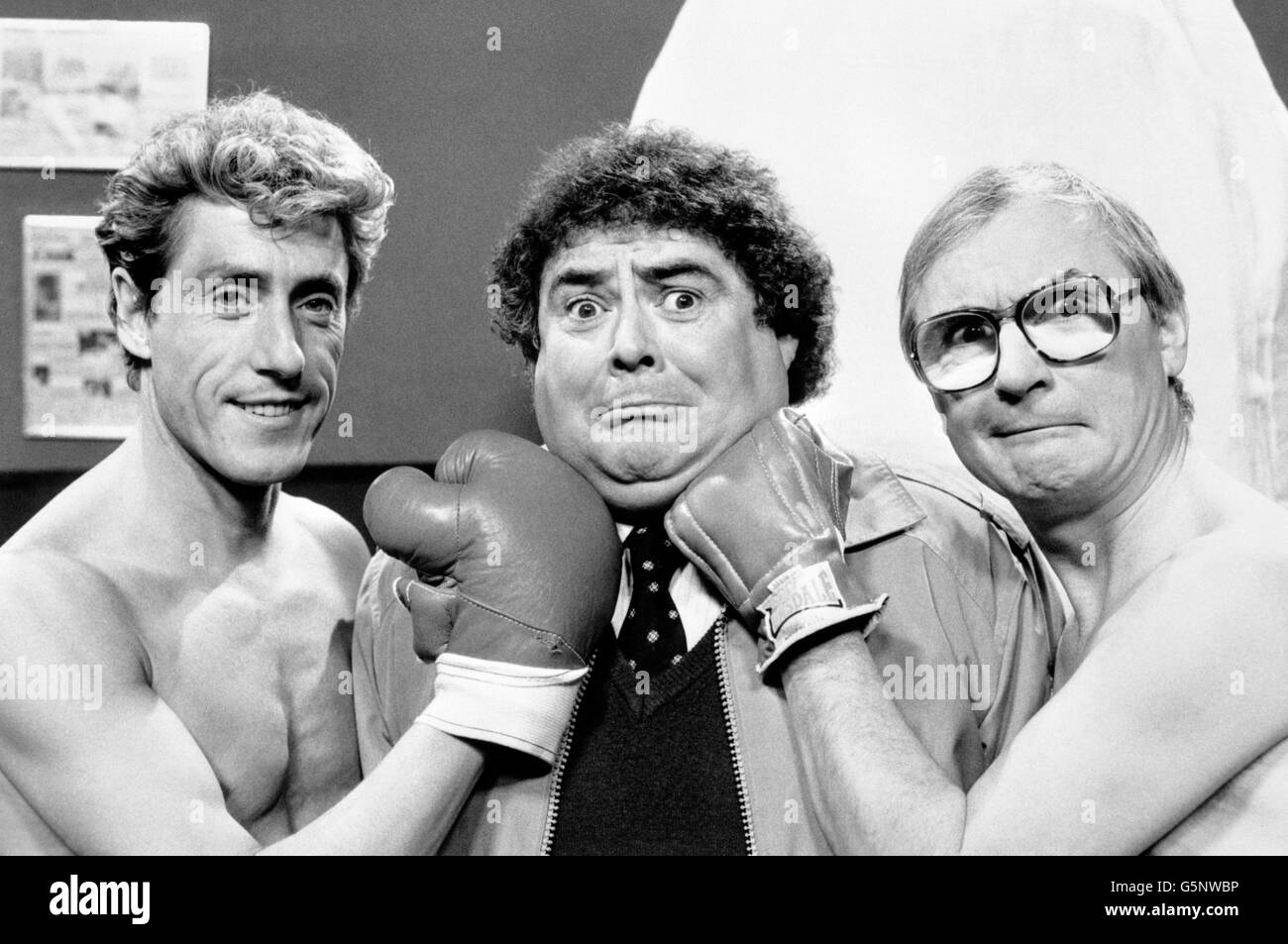 Lead singer of The Who, Roger Daltrey pulling a punch on Eddie Large with the help of Syd Little. The last in the present series of the 'Little and Large' show will be aired on April 5th Stock Photo