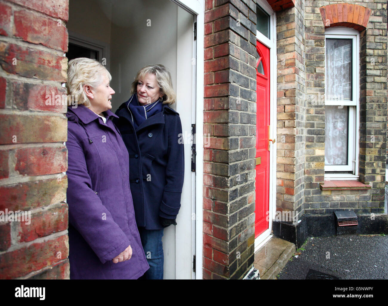 Ann Barnes, Kent's new Police and Crime Commissioner talks to June Jameson in Folkestone, Kent, as part of her outreach bus community tour to engage with members of the public in villages and towns across the county. Stock Photo