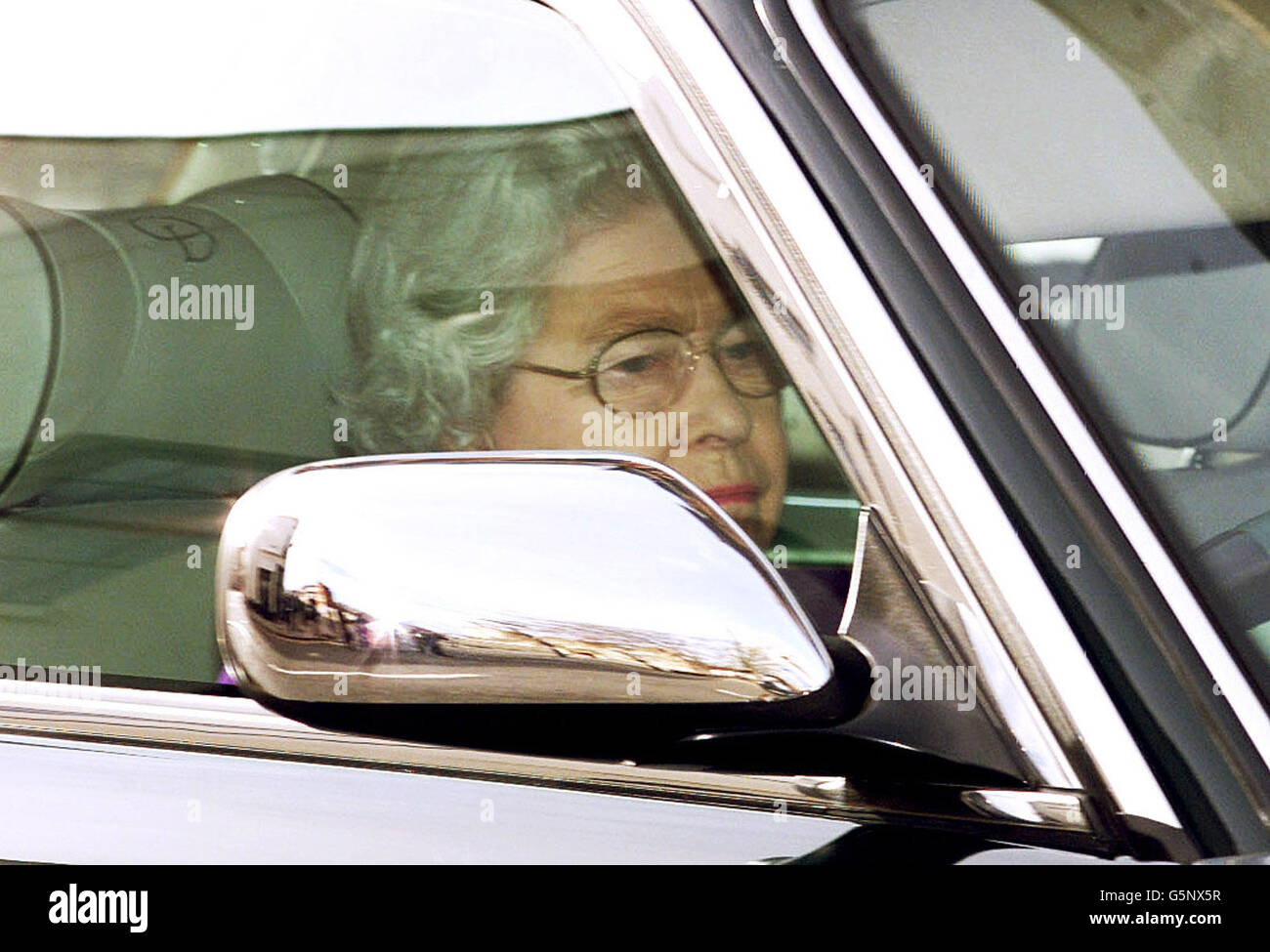 Britain's Queen Elizabeth II, whose younger sister, Princess Margaret, died Saturday aged 71, returns to WIndsor Castle after attending church. Stock Photo