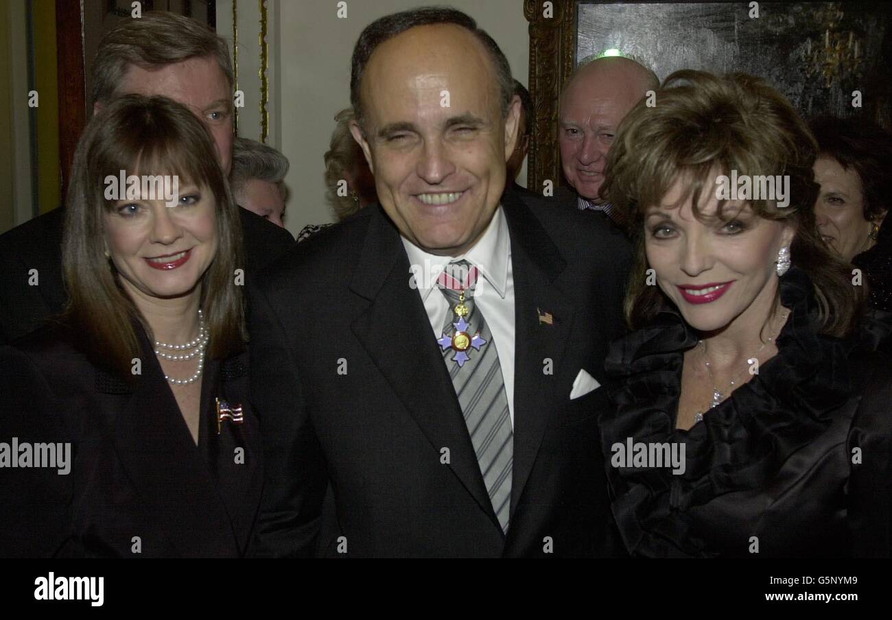 The former Mayor of New York City Rudolph Giuliani, with girl-friend Judith Nathan (left) and actress Joan Collins, at the Royal Academy of Arts in London. * ... The celebrities were at the Academy to attend an auction of photographers works, to raise money for the dependants of the Firemen and Policemen killed by the September 11th terrorist attacks. Mr Giuliani donated some of his own personnel photos of his City, which raised several thousand pounds. Stock Photo