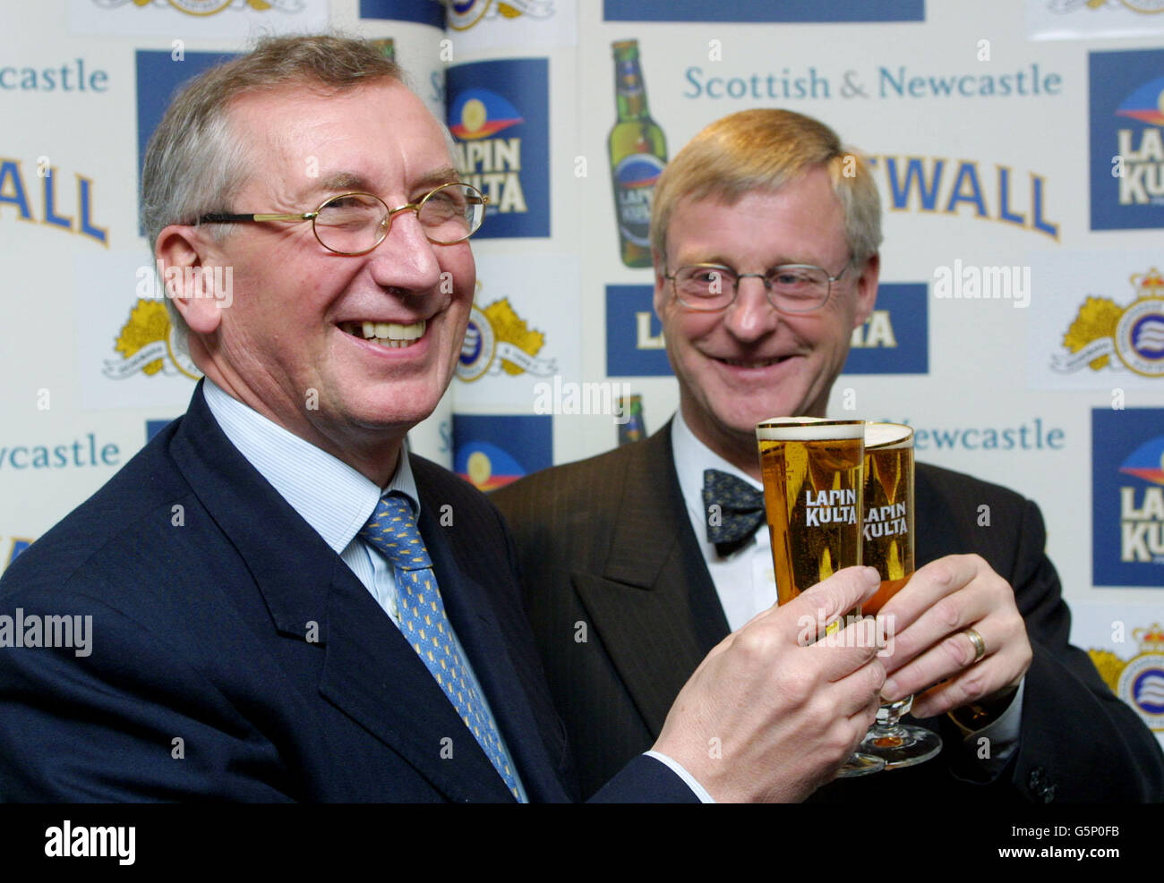 Brian Stewart, (left) Chairman of Scottish & Newcastle brewers and Henrik Therman, Director of Hartwall and Chairman of BBH, make a toast with Lapin Kulta beer, London. Scottish & Newcastle PLC signed an agreement to acquire the Finnish drinks company Hartwell. * The 1.2 billion deal is part of Edinburgh-based S&N's ongoing strategy to become an international presence. Stock Photo