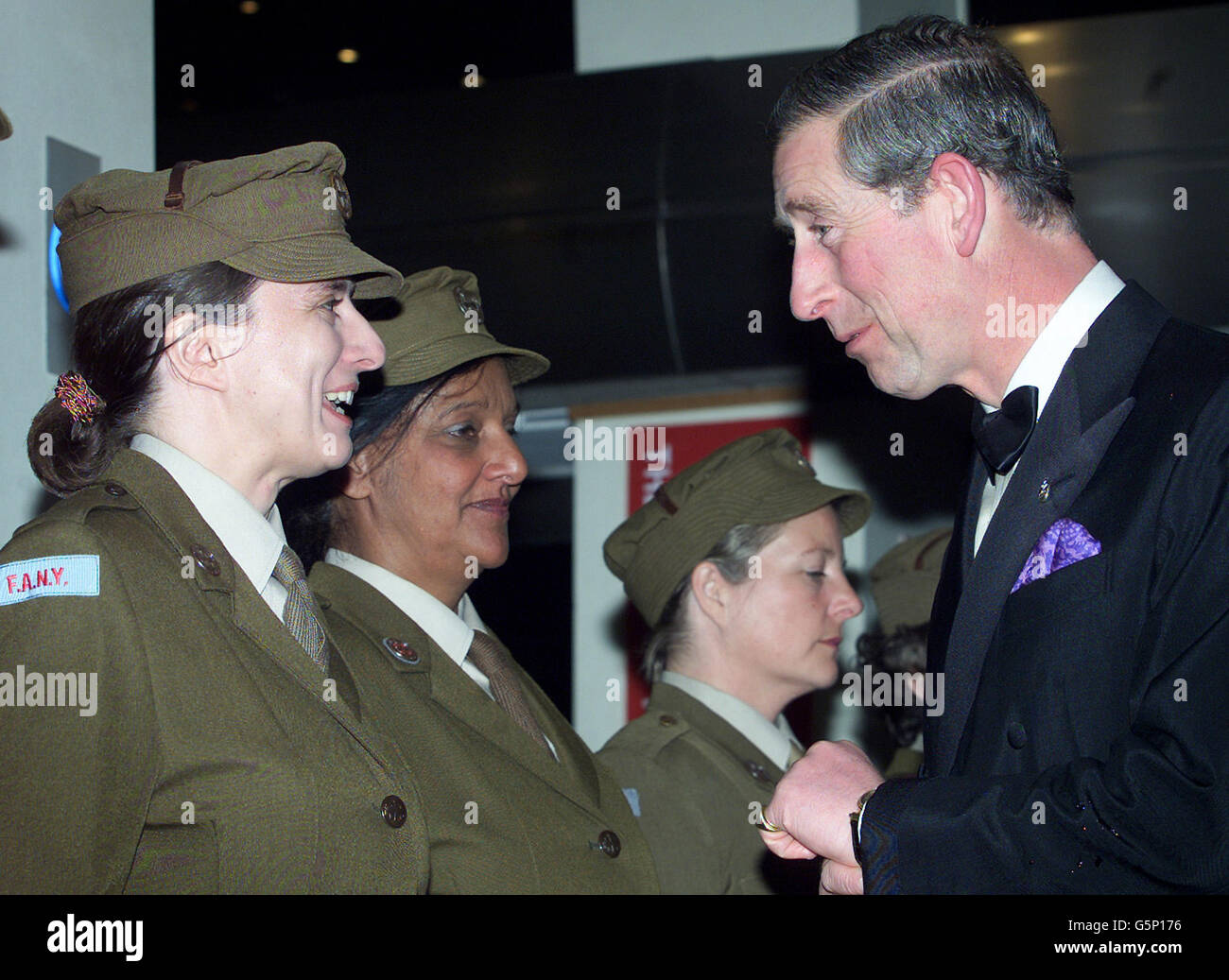 The Prince of Wales meets members of the First Aid Nursing Yeomanry (FANY) at the film premiere of 'Charlotte Gray' at the Odeon Cinema in London's Leicester Square. Stock Photo