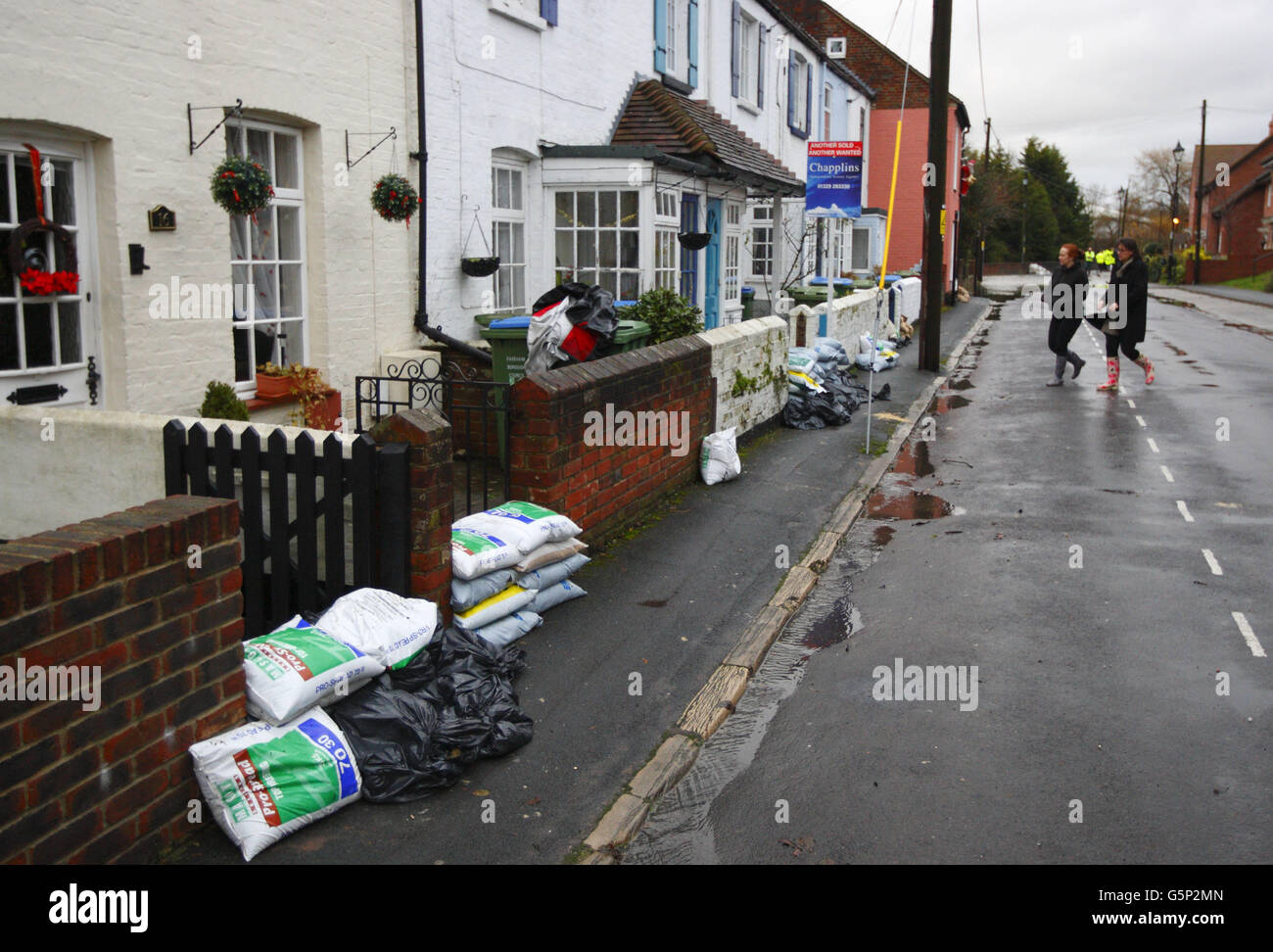 Sandbagged homes in Wallington, Hampshire where residents have been told to leave their homes as the Environment Agency believes the River Wallington may burst its banks. Stock Photo