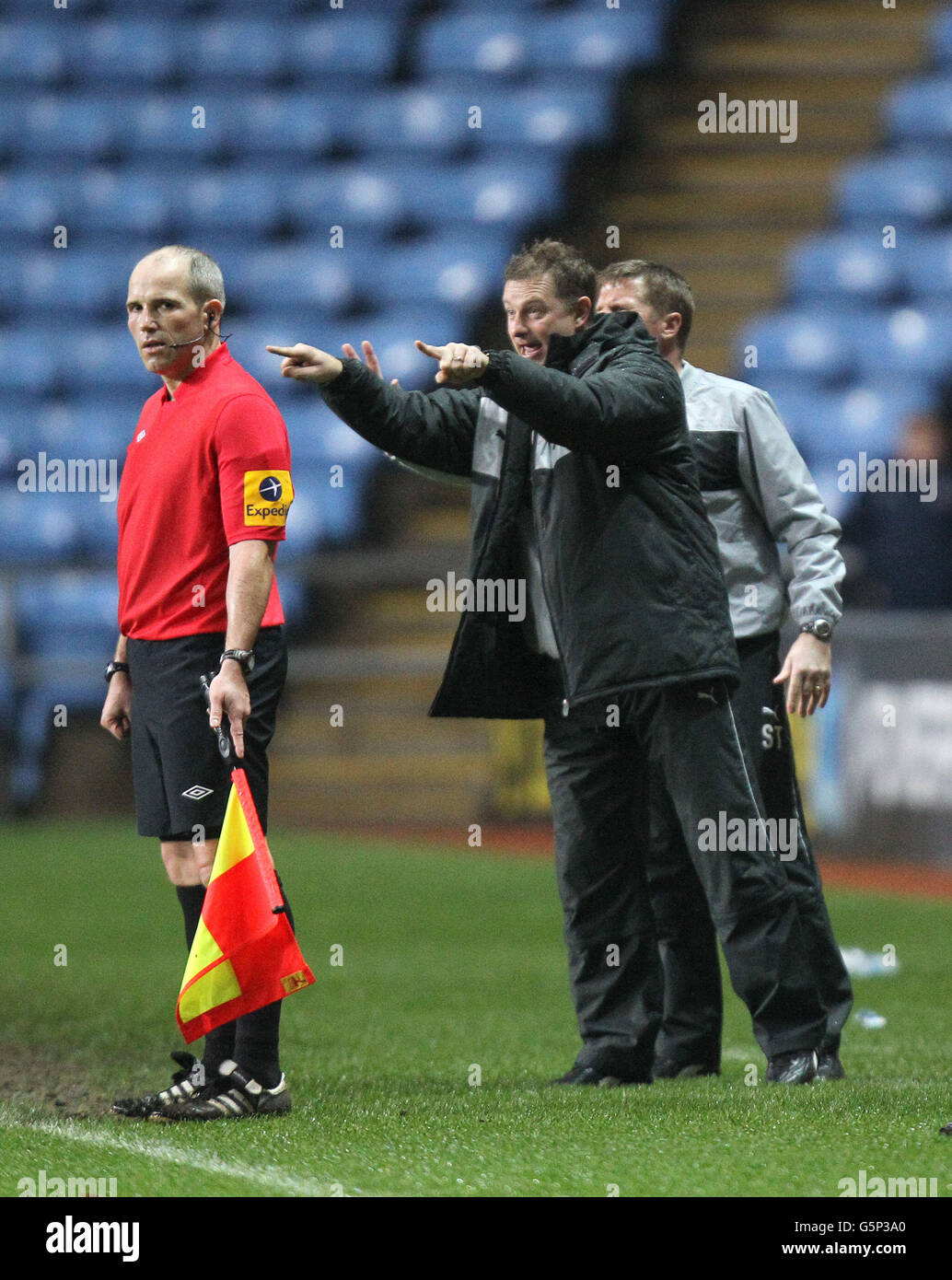 Coventry City's manager Mark Robins shouts out instruction's to his players during the npower Football League one match at the Ricoh Arena, Coventry. Stock Photo