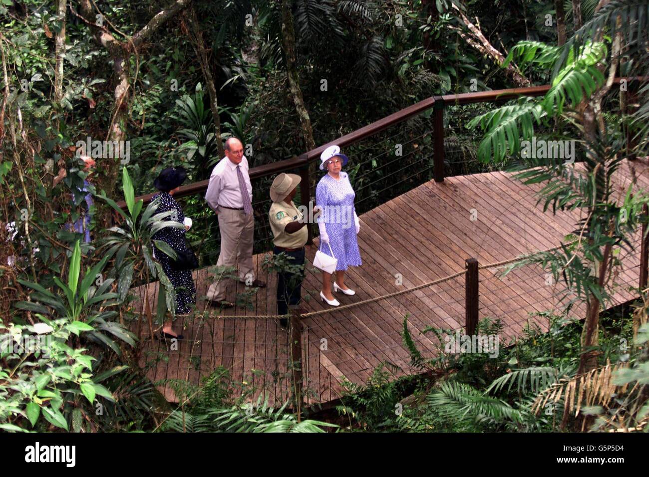 Britain's Queen Elizabeth II on a rainforest walk at Red Peak, near Cairns, Queensland Australia. Stock Photo