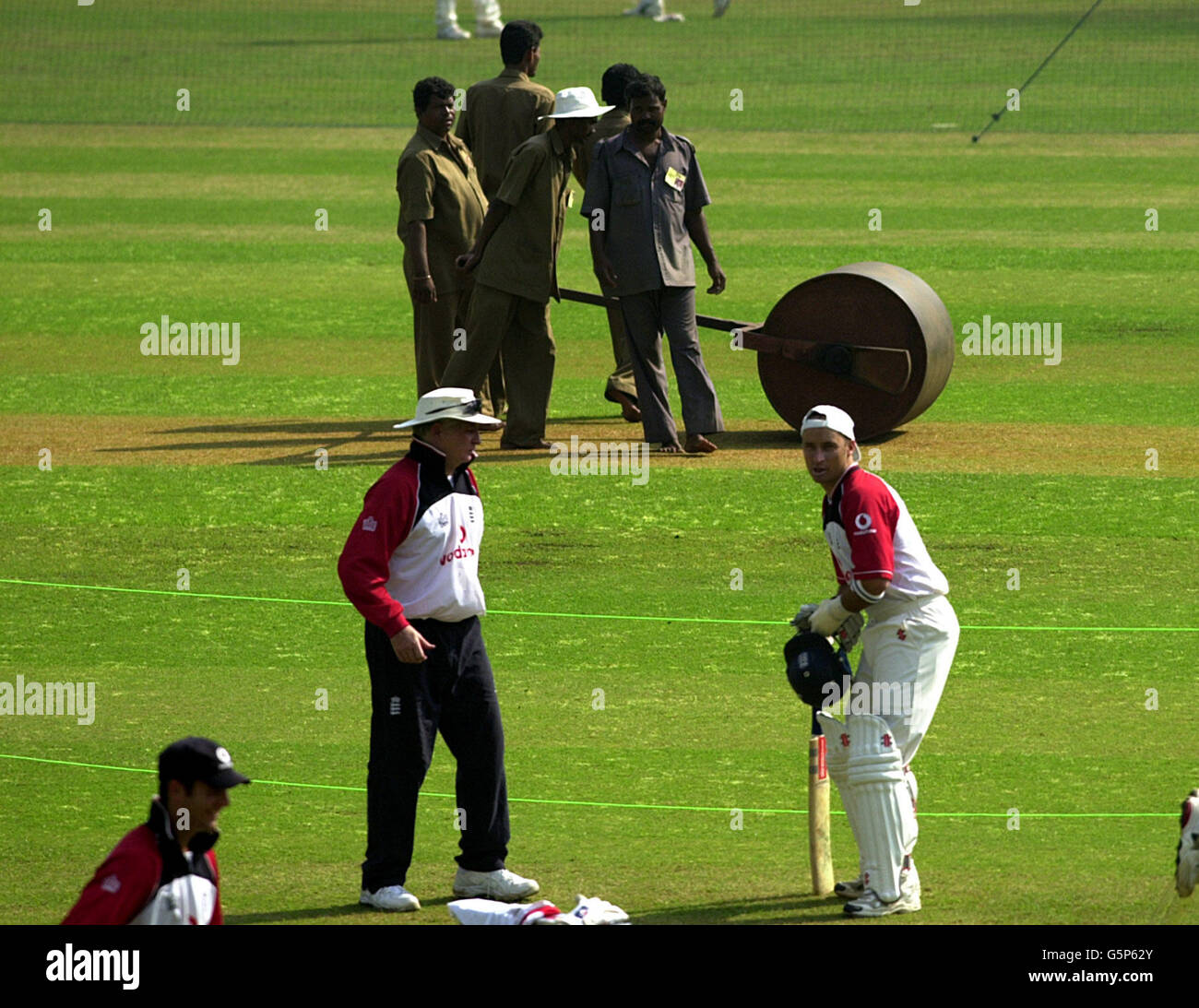 CRICKET Groundsman watch on as England's coach (left) Duncan Fletcher