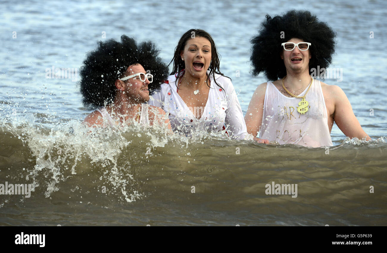 Swimmer take part in the New Year's Day Dip at Whitley Bay in North ...