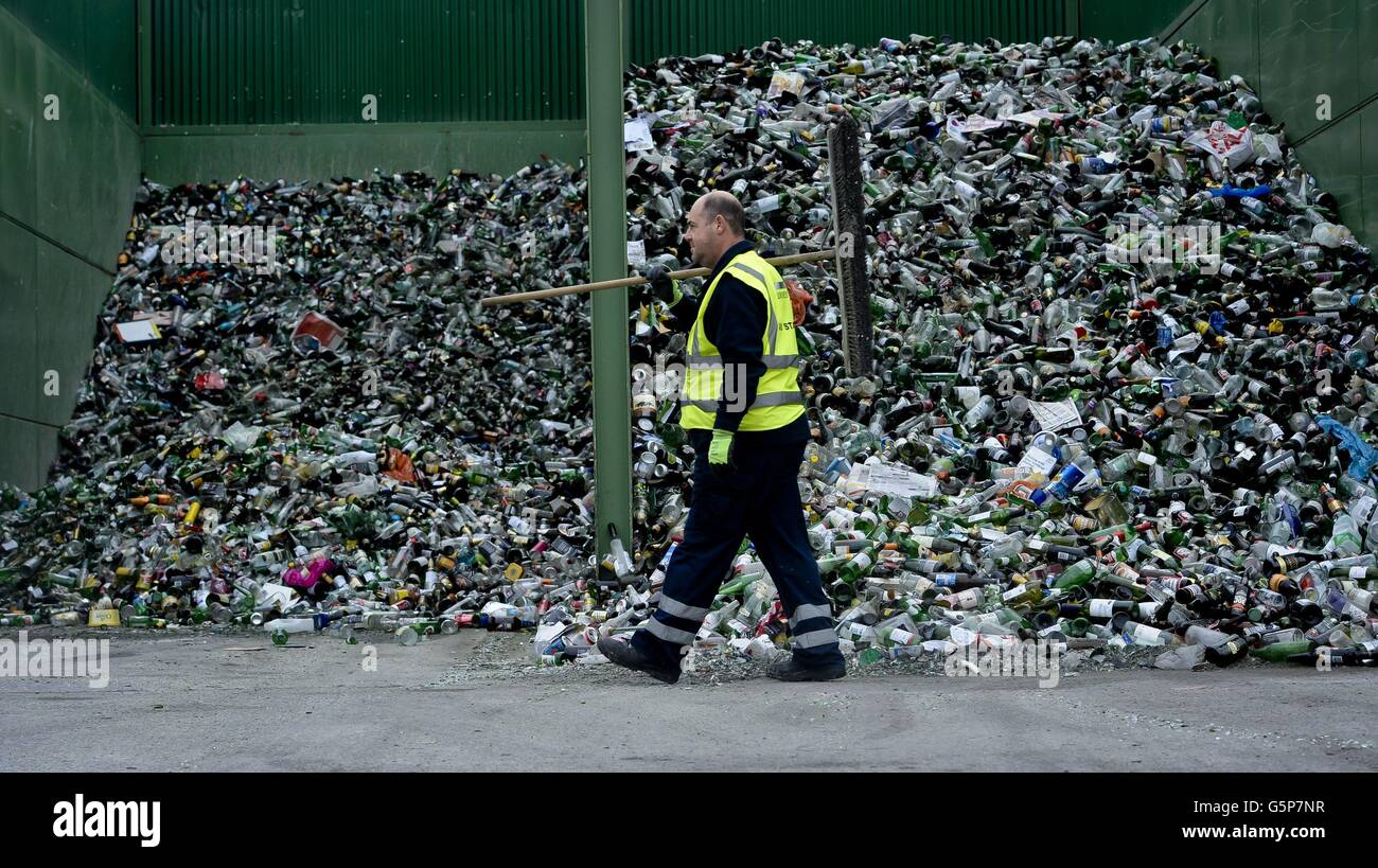 Yard Operations Manager Paul Scriven sweeps thousands glass bottles and