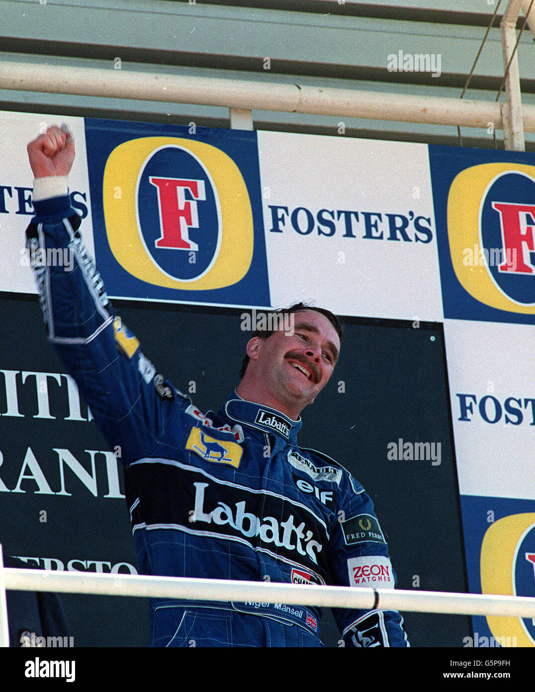 Nigel Mansell celebrates after winning the British Grand Prix at