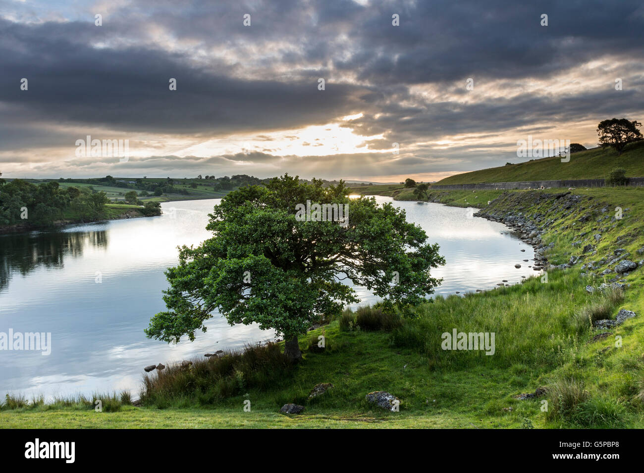 Hury Reservoir, Baldersdale, County Durham, UK. Wednesday 22nd June 2016. UK Weather. It was a cloudy start to the day in northern England, but there was a hint of the brightness to come as the day progresses. Stock Photo