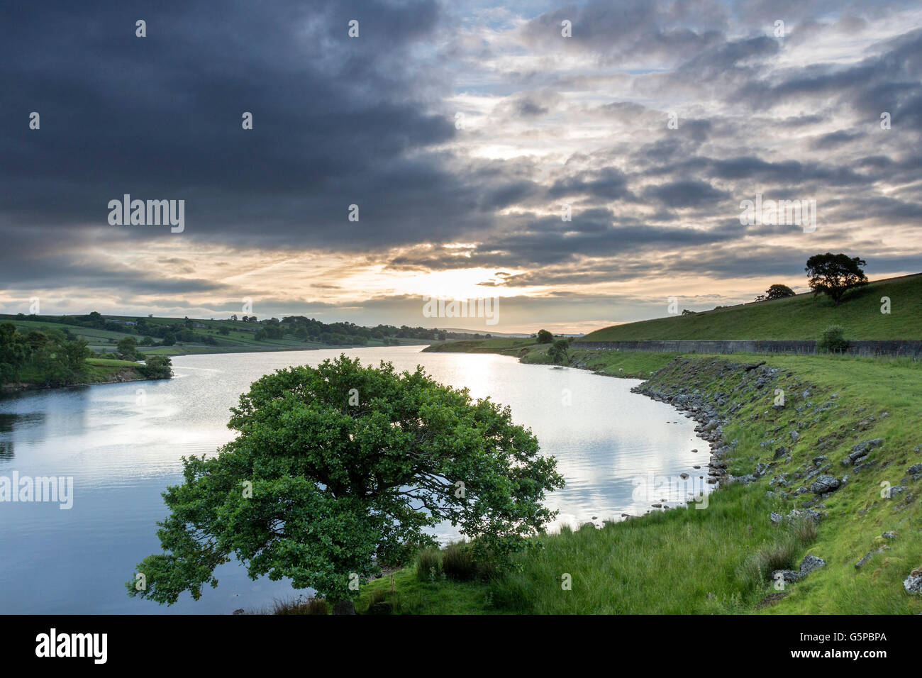 Hury Reservoir, Baldersdale, County Durham, UK. Wednesday 22nd June 2016. UK Weather. It was a cloudy start to the day in northern England, but there was a hint of the brightness to come as the day progresses. Stock Photo