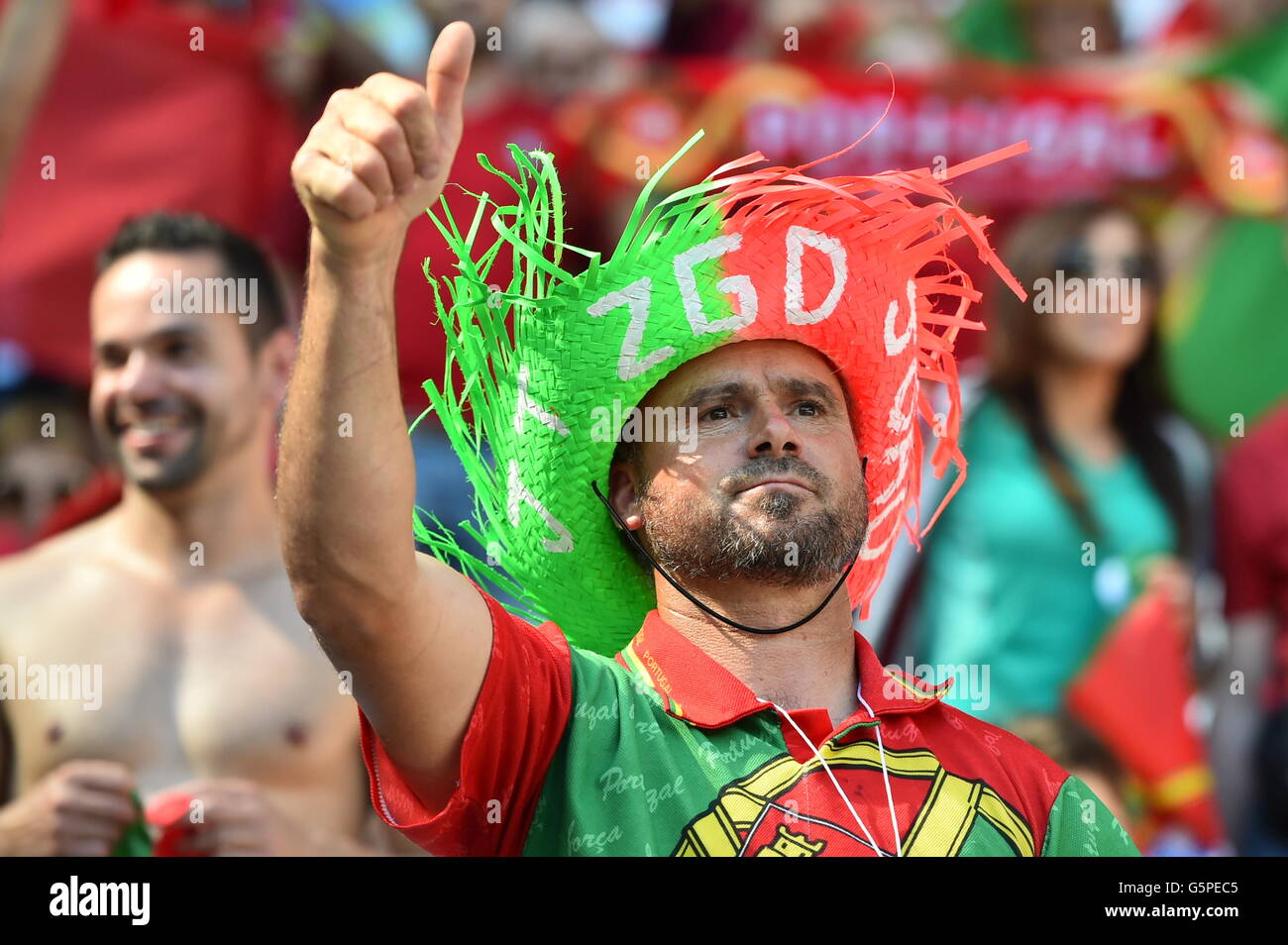 Lyon, France. 22nd June, 2016. Supporters of Portugal cheer prior to the UEFA Euro 2016 Group F soccer match between Hungary and Portugal at the Stade de Lyon in Lyon, France, 22 June 2016. Photo: Uwe Anspach/dpa/Alamy Live News Stock Photo