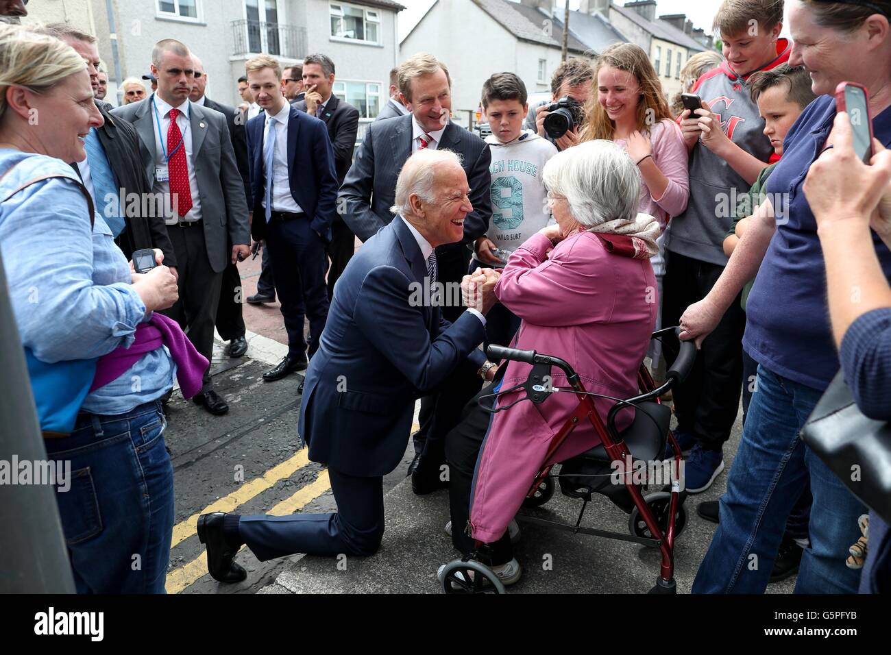 U.S. Vice President Joe Biden greets Mona Curry, 92, the oldest resident during a visit to his ancestral home June 22, 2016 in Ballina, County Mayo, Ireland. Stock Photo