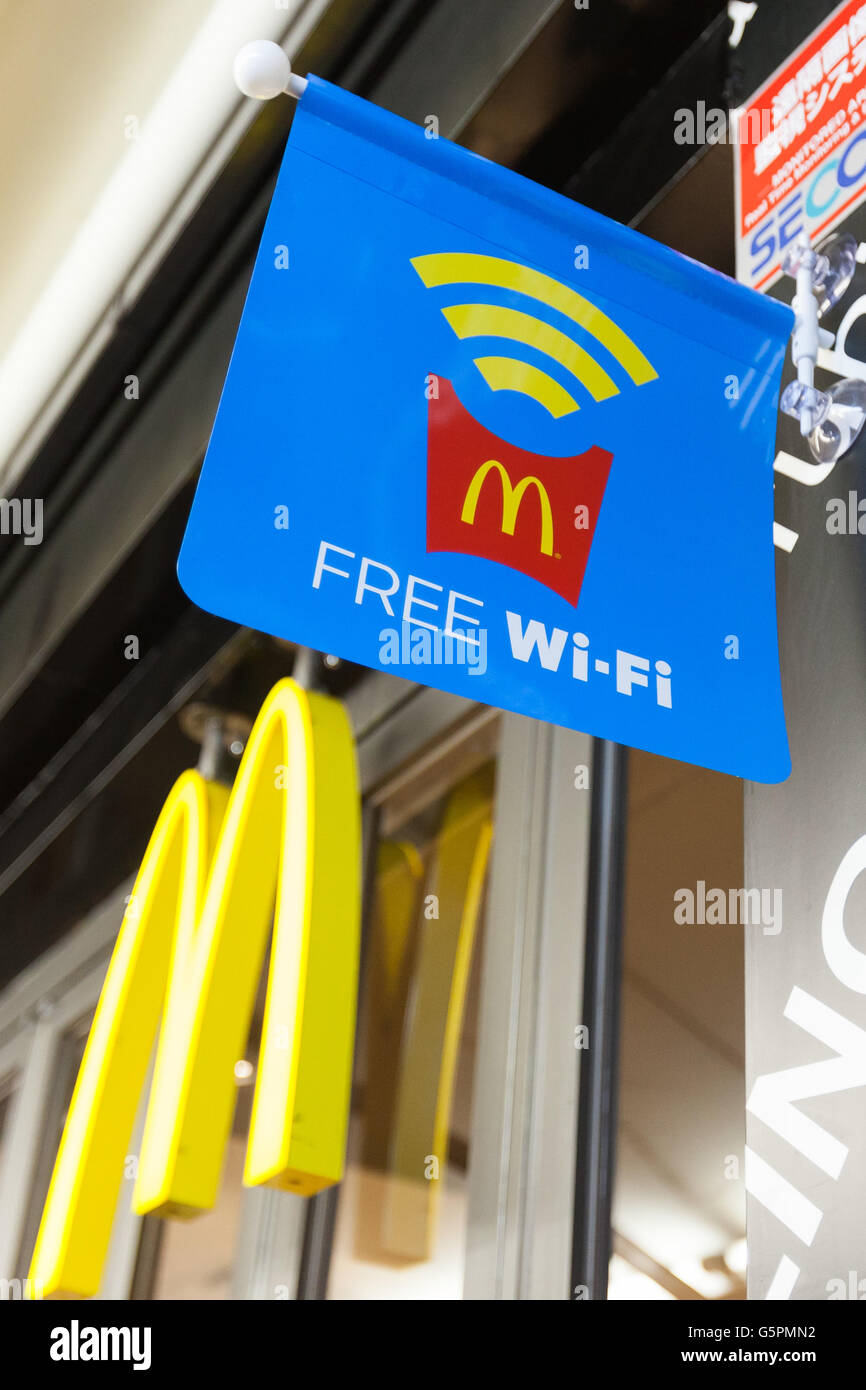 Free wi-fi access promoted outside McDonald's Azabujuban branch on June 23, 2016, Tokyo, Japan. McDonald's Japan launched the service on June 20th and announced that it will provide free wi-fi in some 1,500 branches across Japan by the end of July. © Rodrigo Reyes Marin/AFLO/Alamy Live News Stock Photo