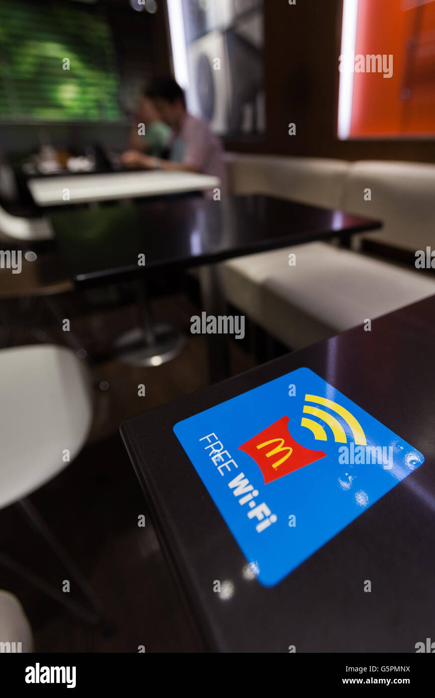 Free wi-fi access promoted inside McDonald's Azabujuban branch on June 23, 2016, Tokyo, Japan. McDonald's Japan launched the service on June 20th and announced that it will provide free wi-fi in some 1,500 branches across Japan by the end of July. © Rodrigo Reyes Marin/AFLO/Alamy Live News Stock Photo