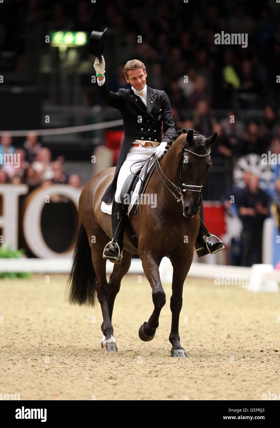 Netherlands Edward Gal riding Glock's Undercover in the Reem Acra FEI World Cup Dressage Leg - Grand Prix freestyle at the Olympia, The London International Horse Show Stock Photo