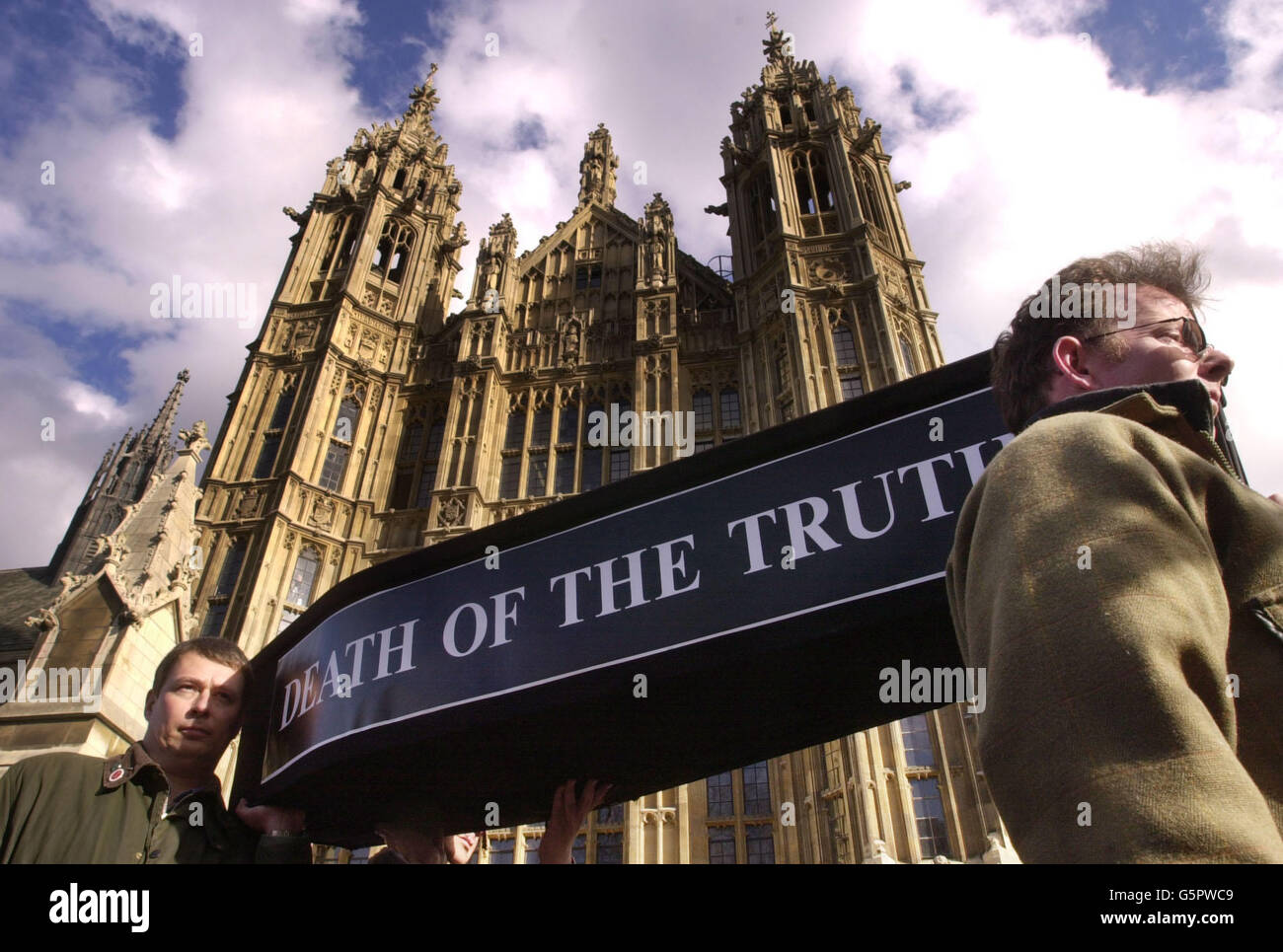 Pall bearers carring a coffin outside the House of Commons in London where it delivered a petition of a quarter of a million signatures to shadow attorney general Bill Cash calling for a public inquiry into foot-and-mouth disease outbreak which hit farms nationwide last year. Stock Photo