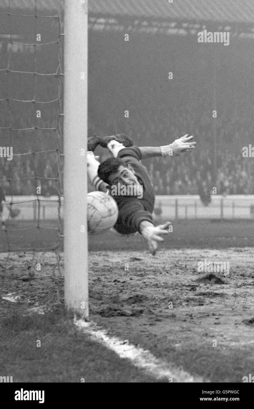 Chelsea goalkeeper Peter Bonetti dives to try and stop a header