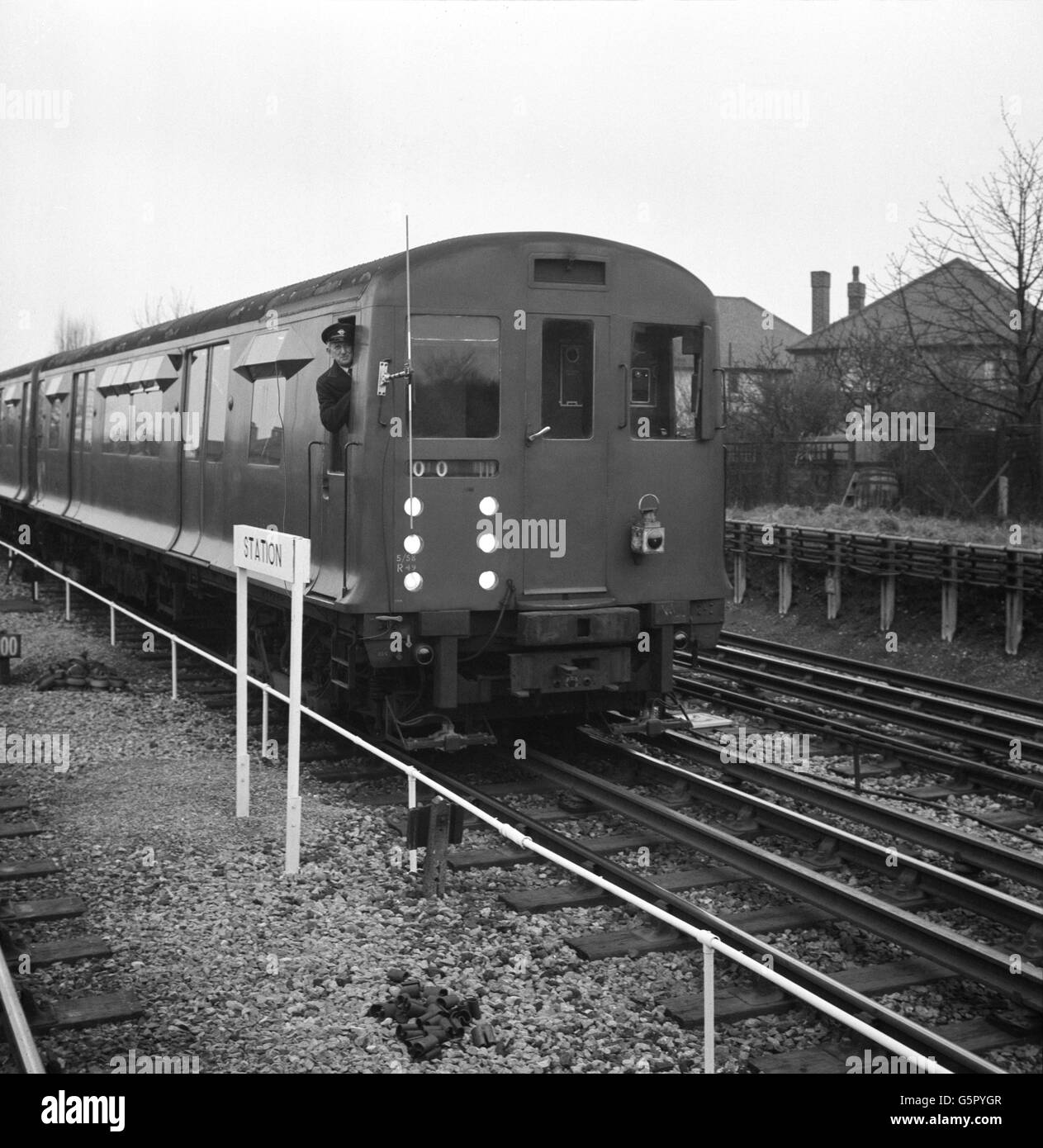 A specially-equipped District Line train on the move at South Ealing, London, which is being used by London Transport in trials to decide the feasibility of driving trains automatically. The first tests are being carried out along a one-mile stretch of track between South Ealing and Acton Town. In the cab is Jack Sharpley, of Hounslow, Middlesex, a test driver who has been taking part in the project for 11 years. Stock Photo