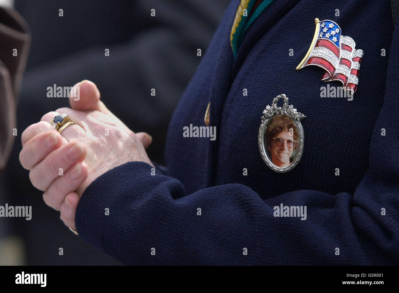 American Deirdre Fortune, 53, from New York City, clasps her hands next to a photo of her husband Robert who died in the Lockerbie plane crash, as the appeal of Abdelbaset Ali Mohmed Al Megrahi concerning the Lockerbie bombing is rejected at Camp Zeist. Stock Photo