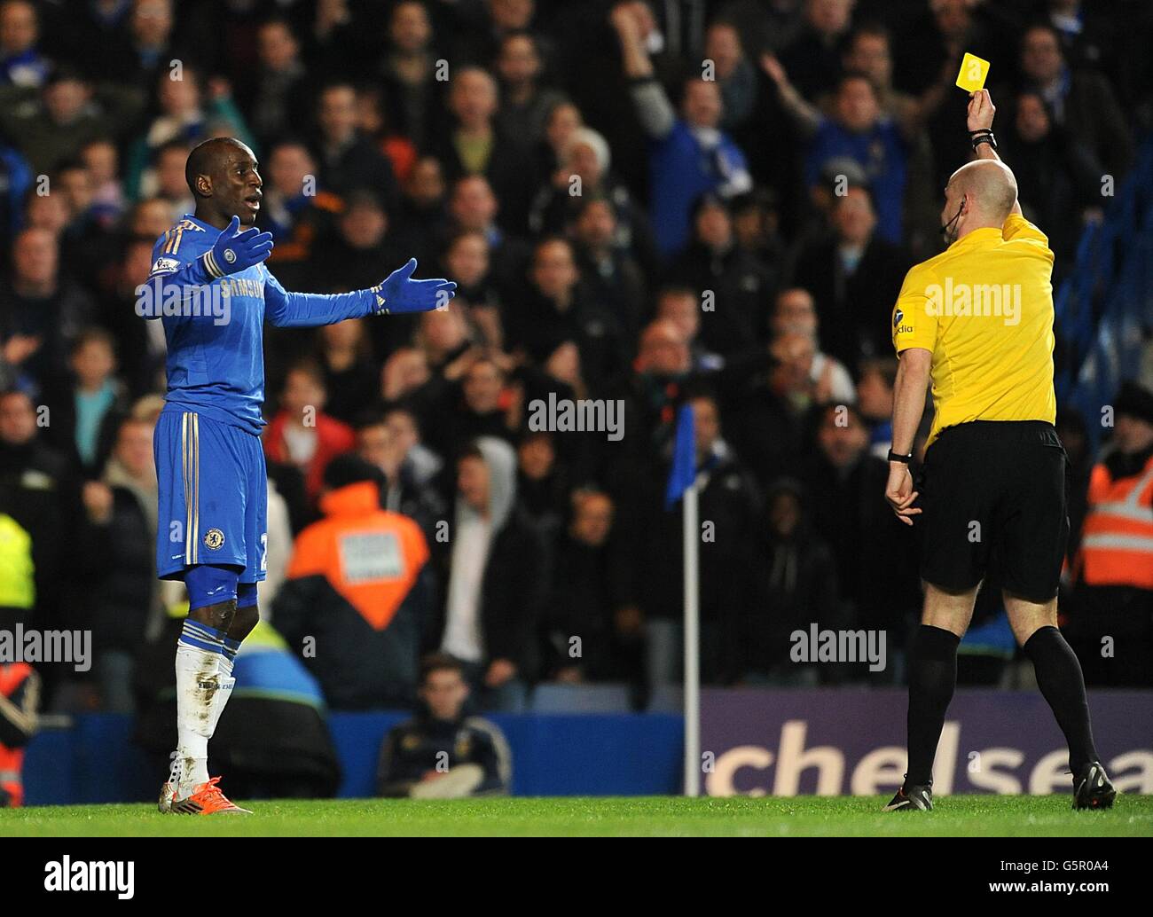 Chelsea is booked by the referee for diving hi-res stock photography ...