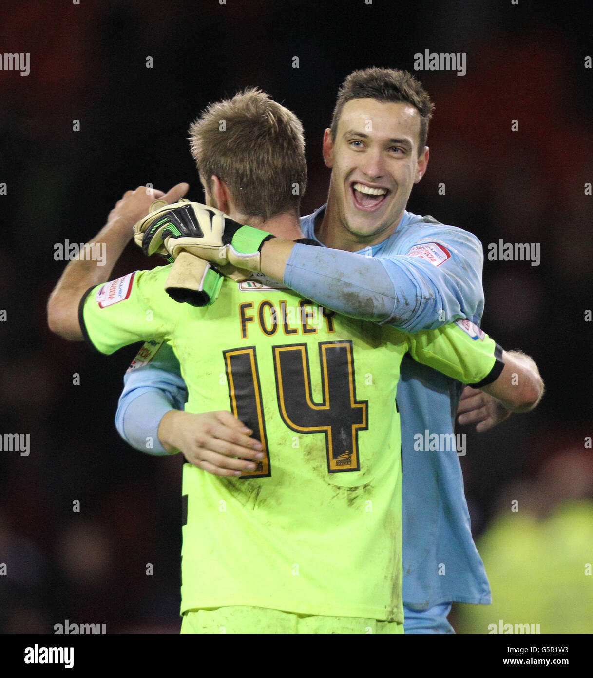 Yeovil Town's goalkeeper Marek Stech celebrates their victory with teammate Sam Foley at the end of the game during the npower Football League One match at Bramall Lane, Sheffield. PRESS ASSOCATION Photo. Picture date: Saturday January 12, 2013. See PA story SOCCER Sheff Utd. Photo credit should read: PA Wire. Stock Photo