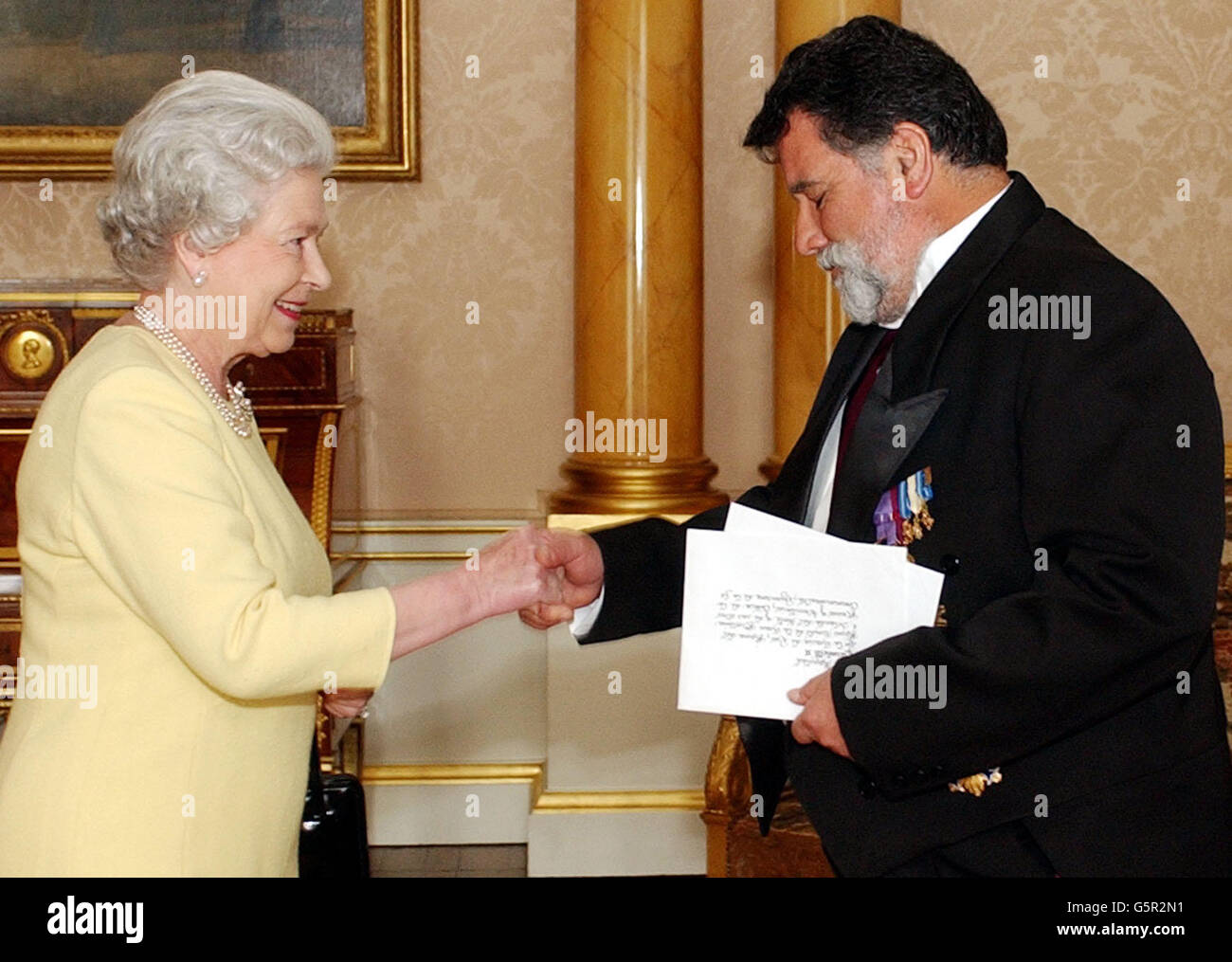 Britain's Queen Elizabeth II receives His Excellency the Ambassador of Peru, Mr Armando Lecaros de Cossio who presented his letter of credence, at Buckingham Palace, London. Stock Photo