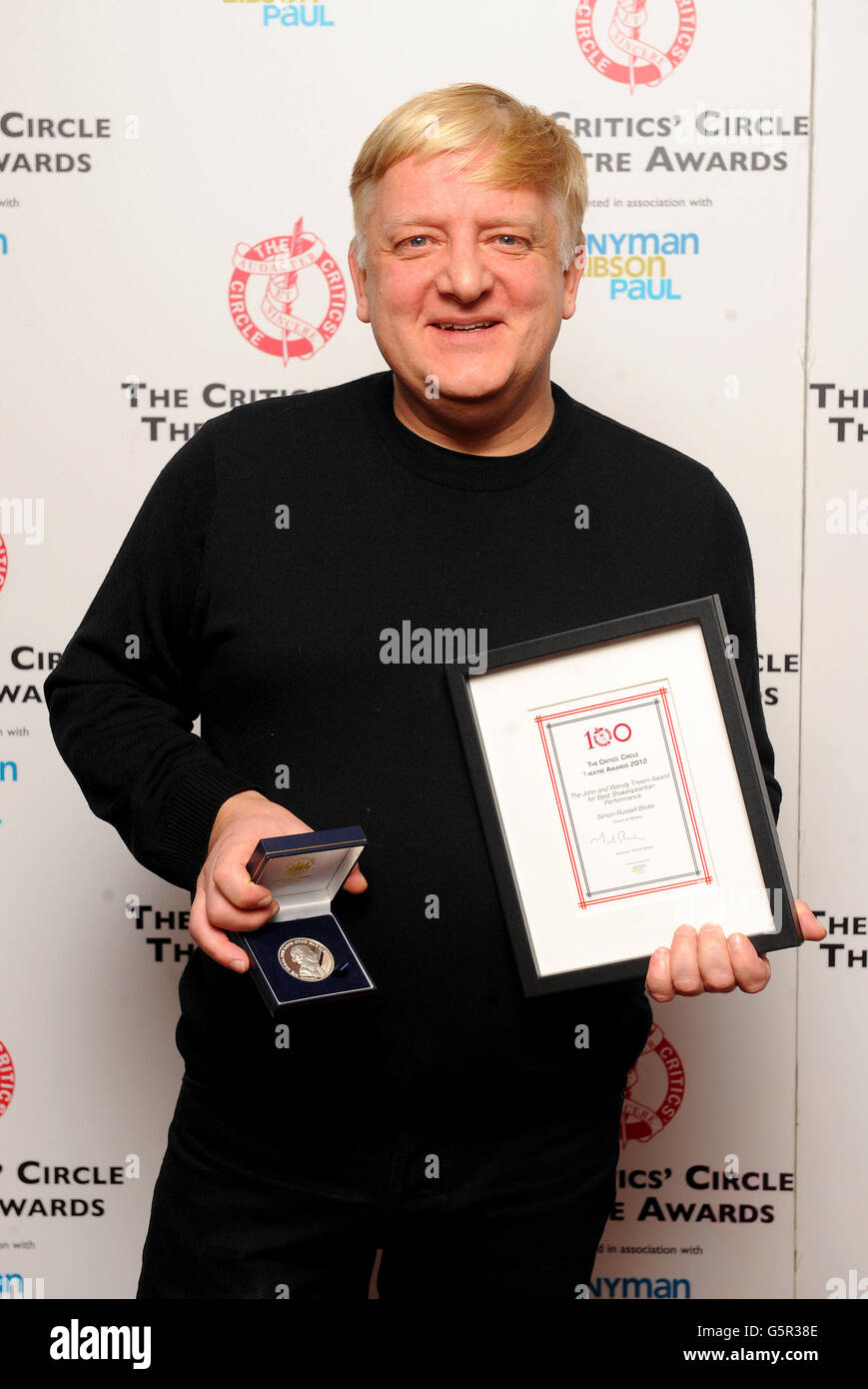 Simon Russell Beale wins the Best Shakespearean Performance award, in Timon of Athens, at the Critic's Circle Theatre awards held at the Prince of Wales theatre in London. Stock Photo