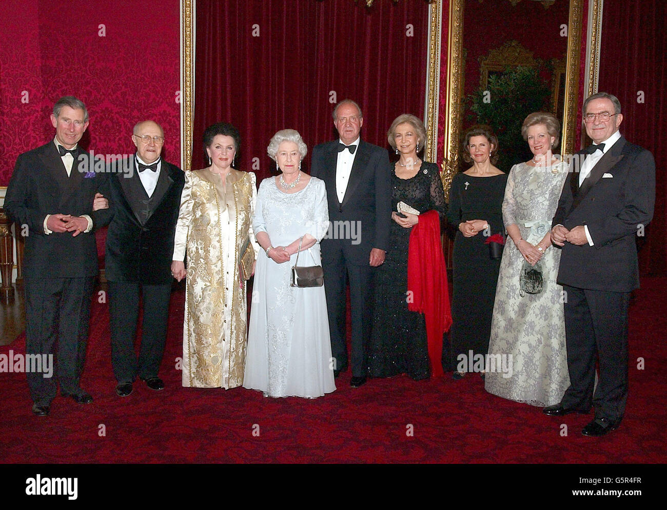 (l/r) The Prince of Wales, Mstilav Rostropovich, Mrs Rostropovich, Britain's Queen Elizabeth II, King Juan Carlos of Spain, Queen Sofia of Spain, Queen Silvia of Sweden, Queen Anne-Marie of Greece and King Constantine of Greece at a reception at Buckingham Palace. * prior to a concert. Stock Photo